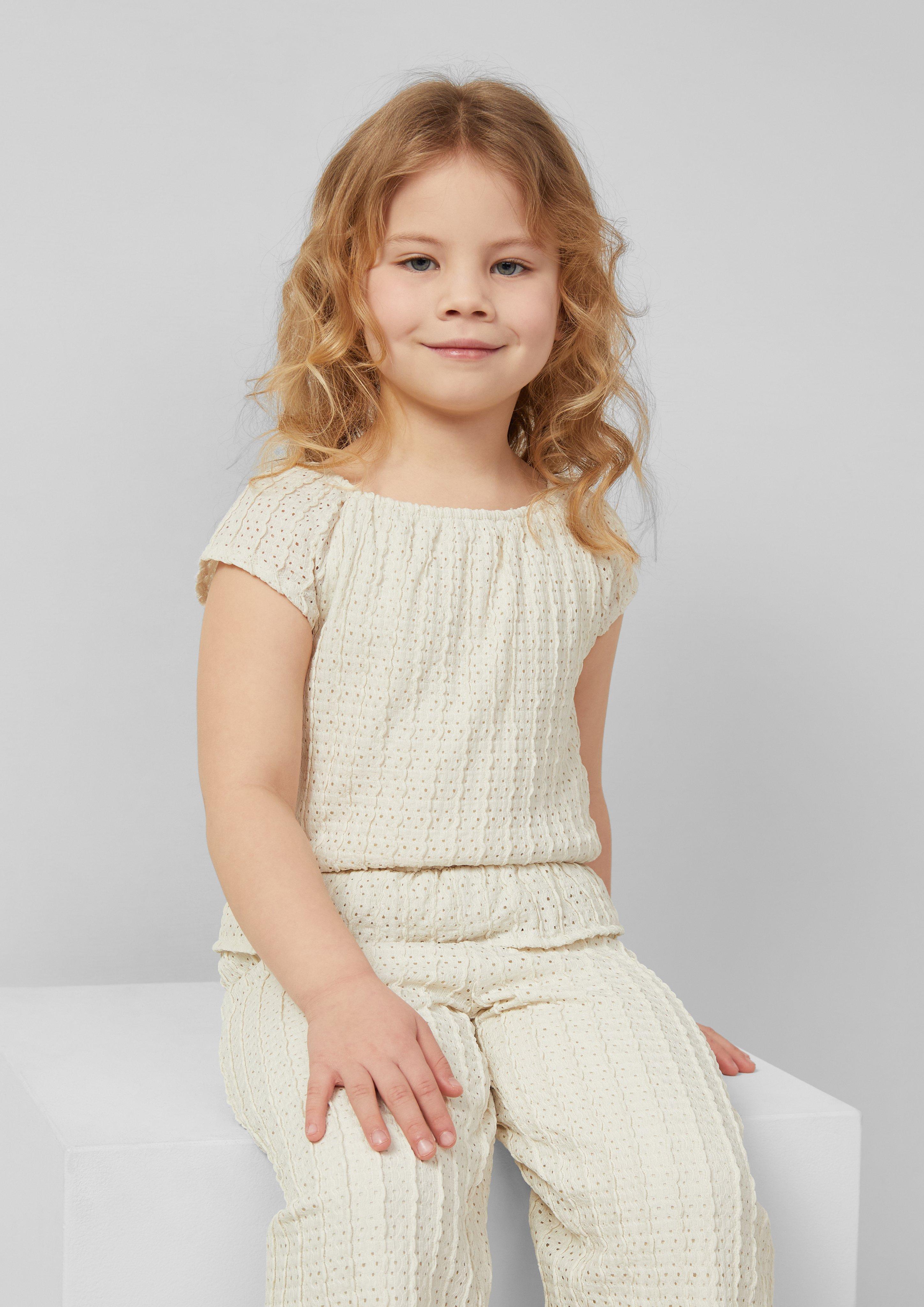 Strukturierter Overall mit Lochmuster und Volants