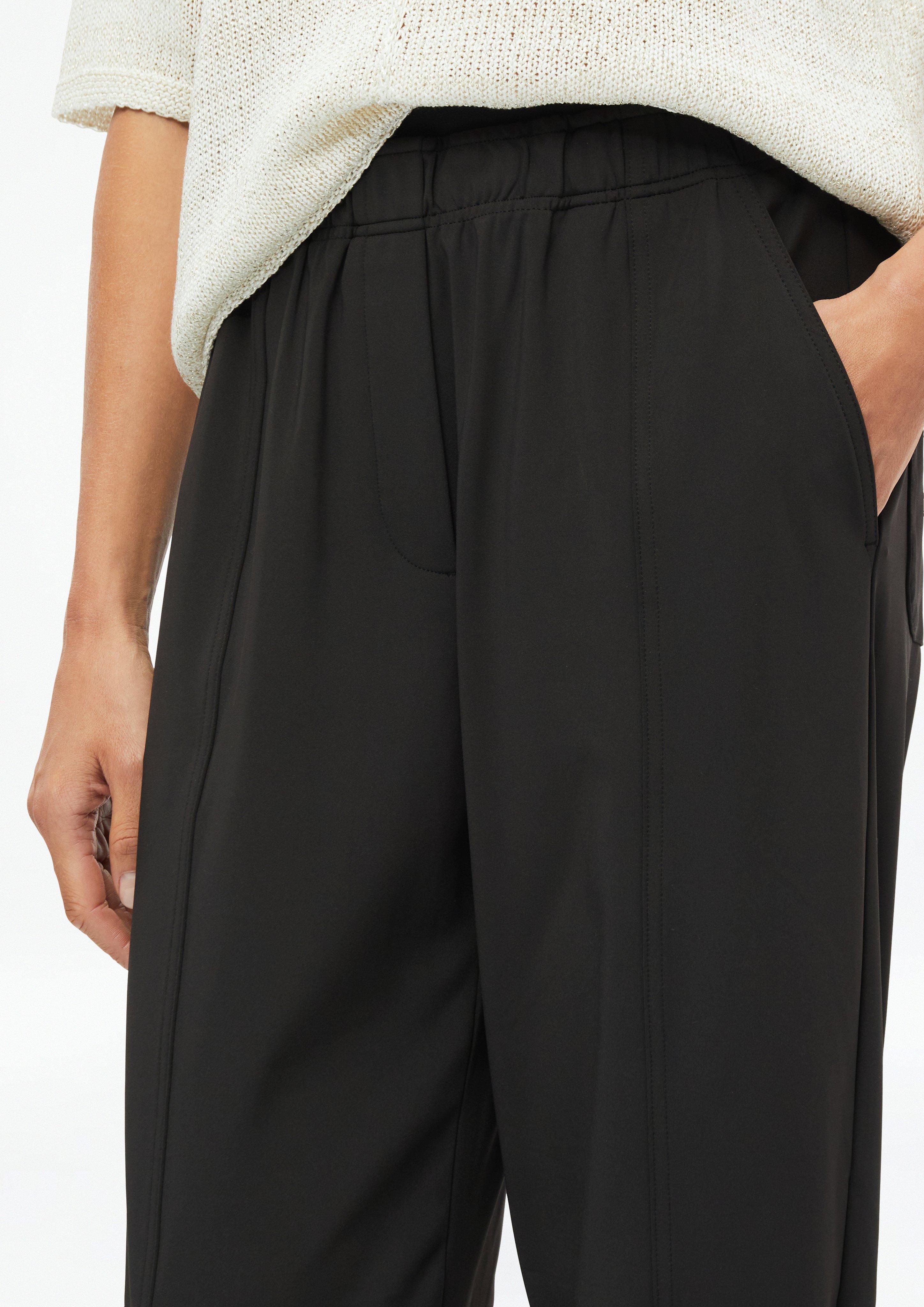 Women Stretchy barrel-leg pants with an elastic waistband in black by s.Oliver BLACK LABEL