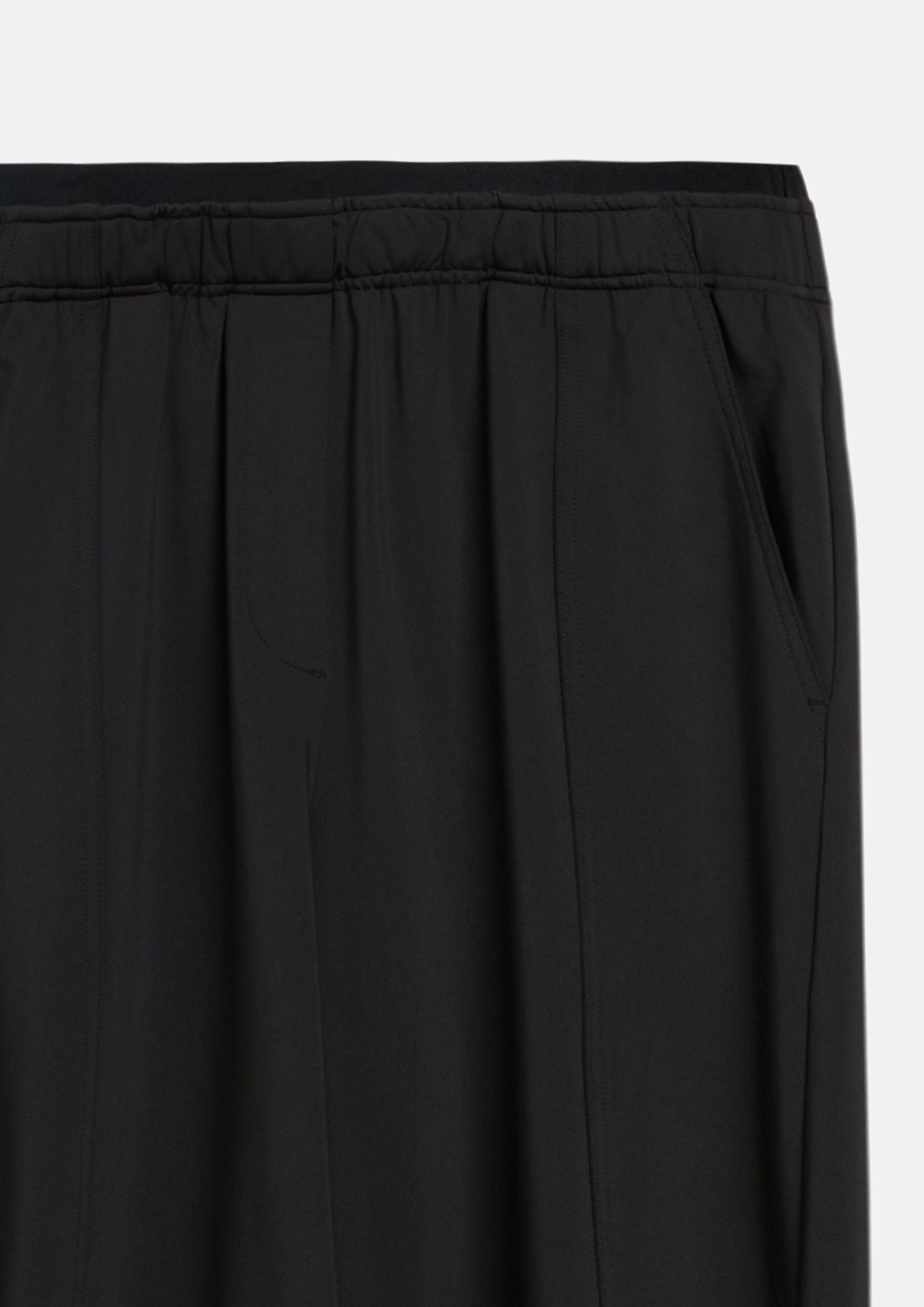 Women Stretchy barrel-leg pants with an elastic waistband in black by s.Oliver BLACK LABEL
