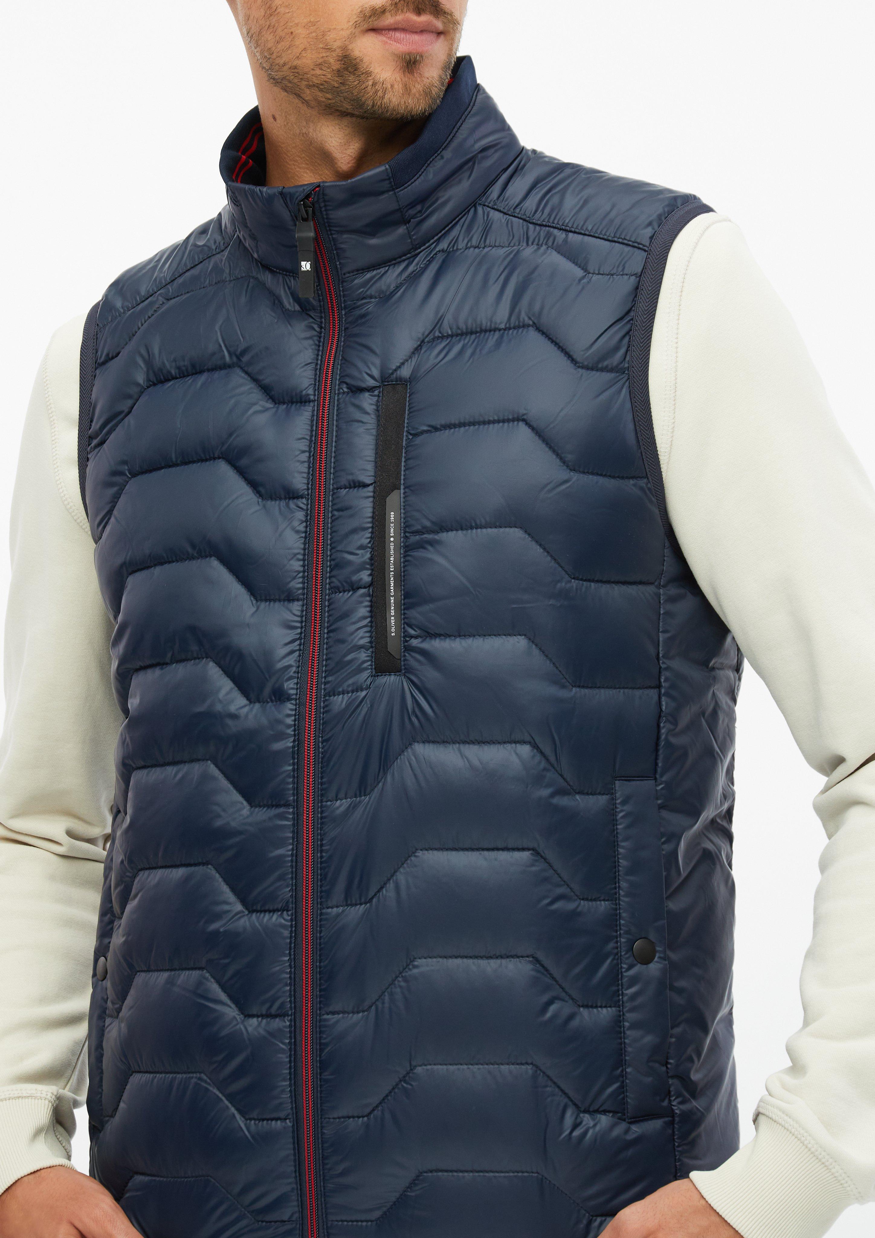 Heren Waterafstotend gewatteerd vest met sportieve details in blauw van s.Oliver