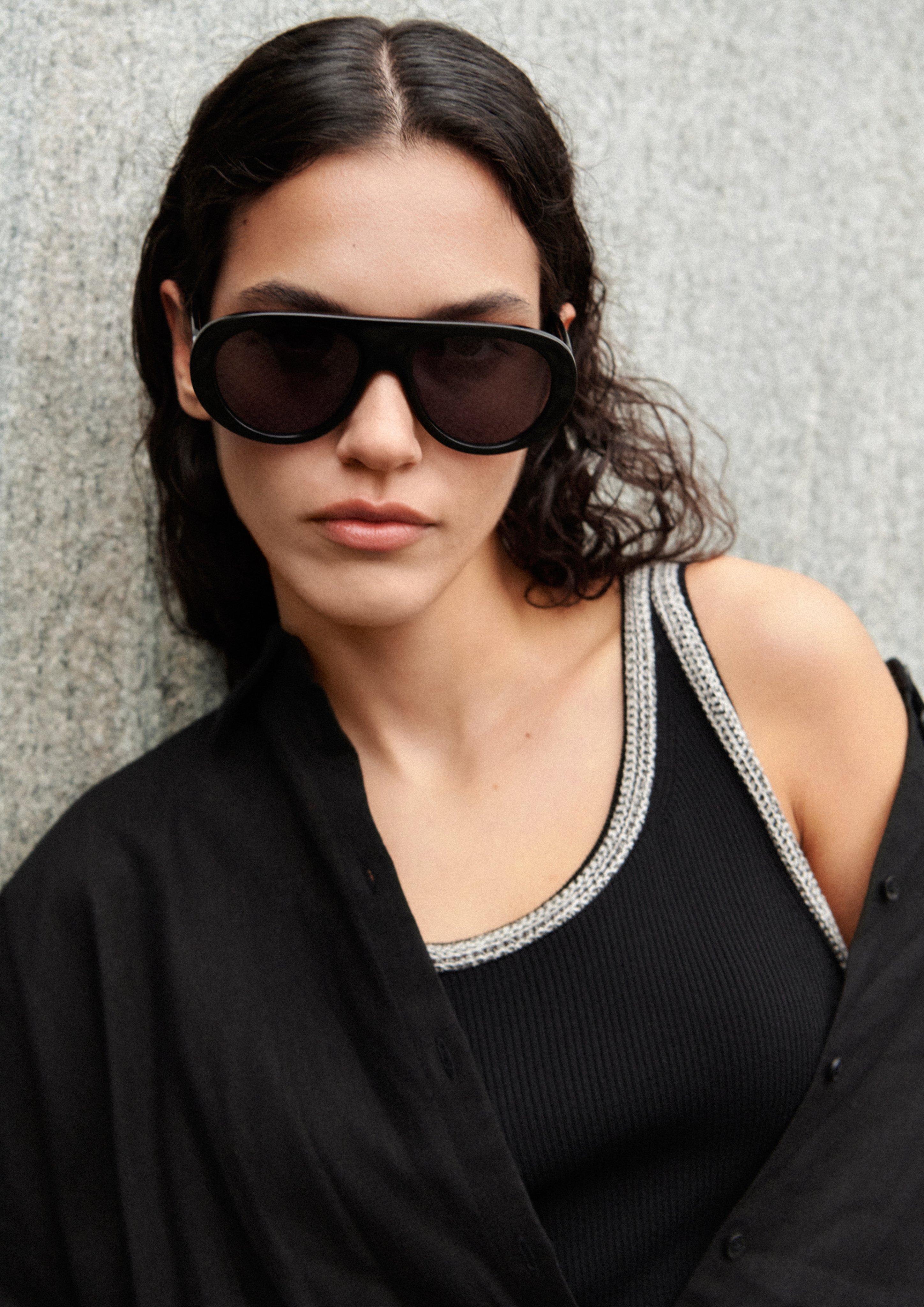 Knitted vest in black by COMMA