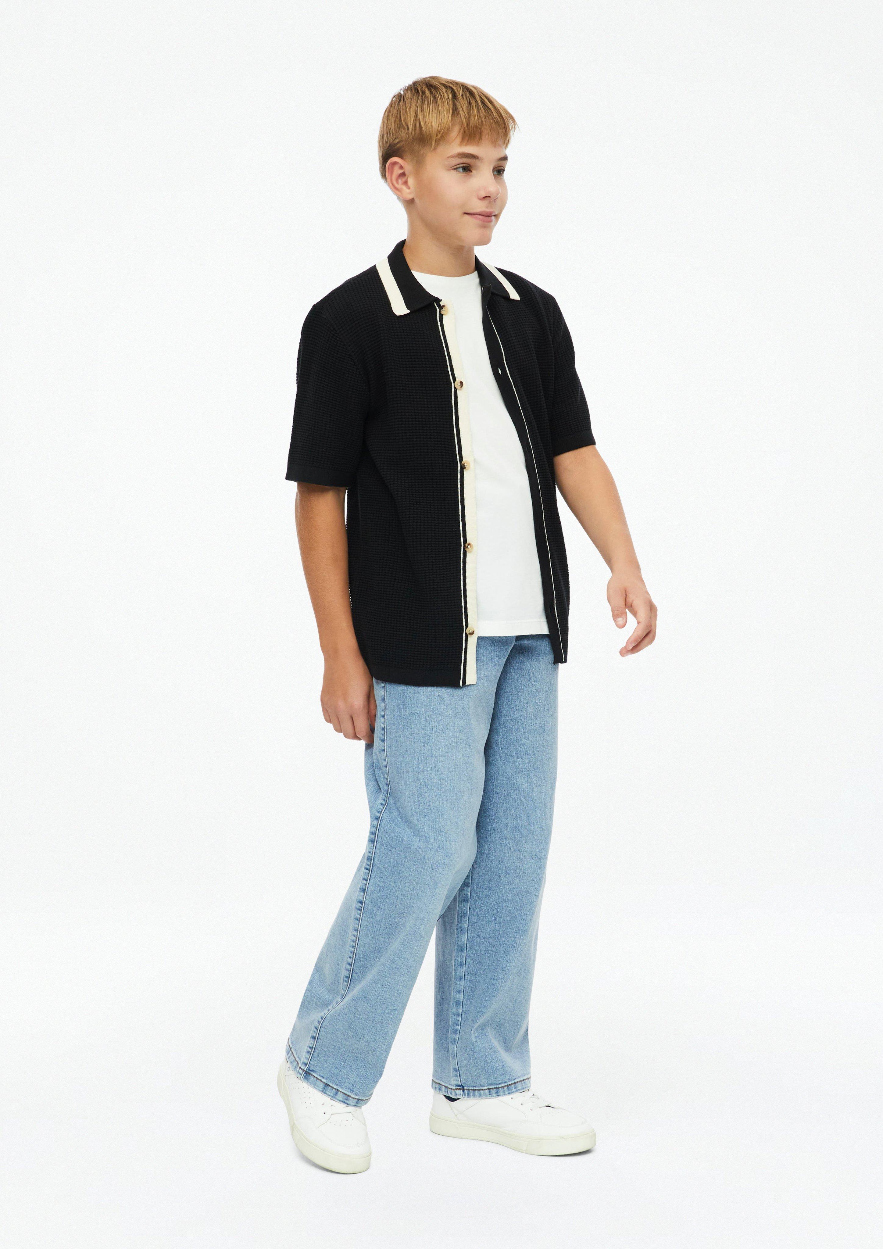 Junior Gestructureerd gebreid poloshirt met knoopsluiting in zwart van s.Oliver