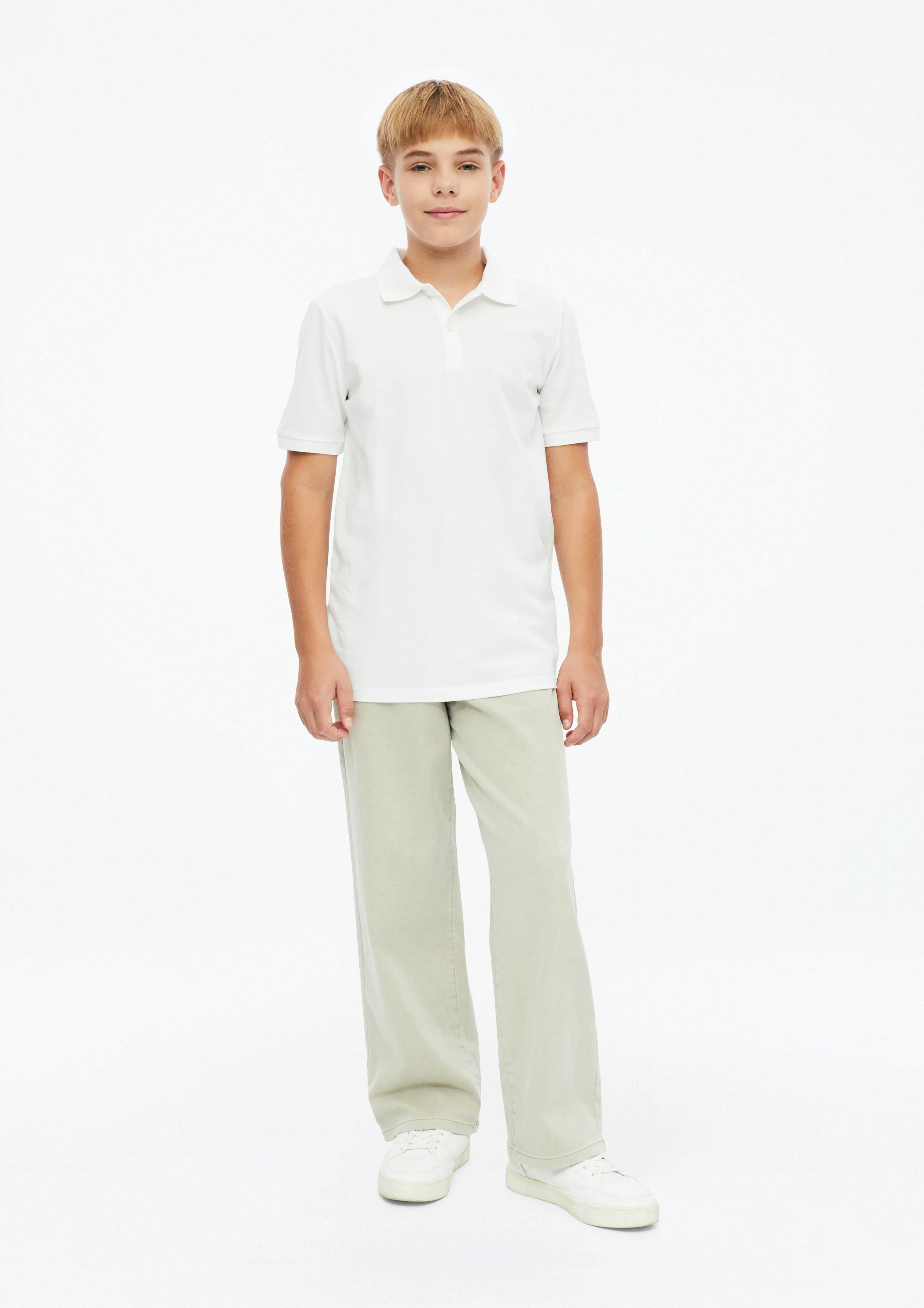 Kids Cotton piqué polo shirt in white by s.Oliver