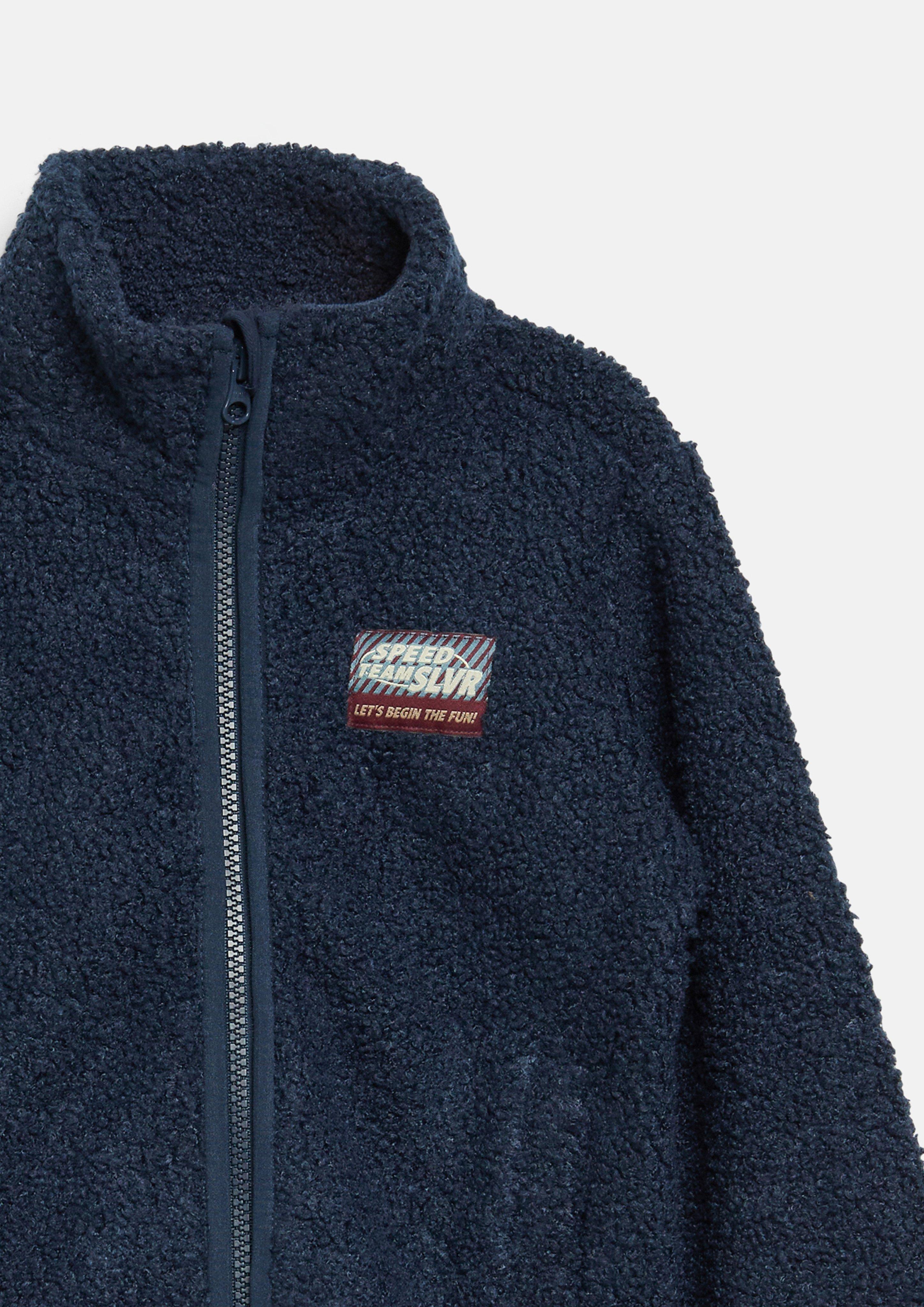 Kids Teddy jacket with stand-up collar and patch in blue by s.Oliver