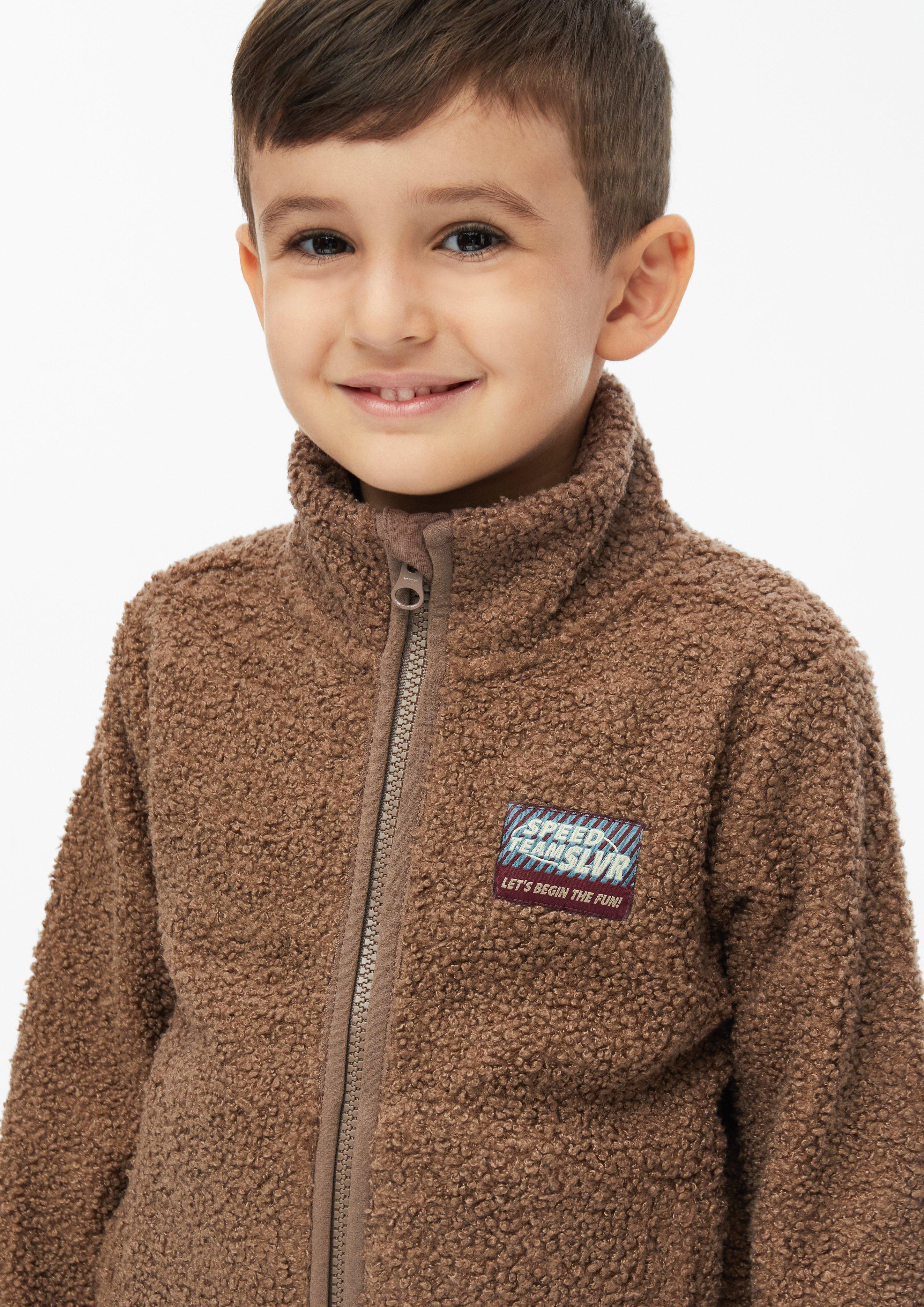 Kids Teddy jacket with stand-up collar and patch in brown by s.Oliver
