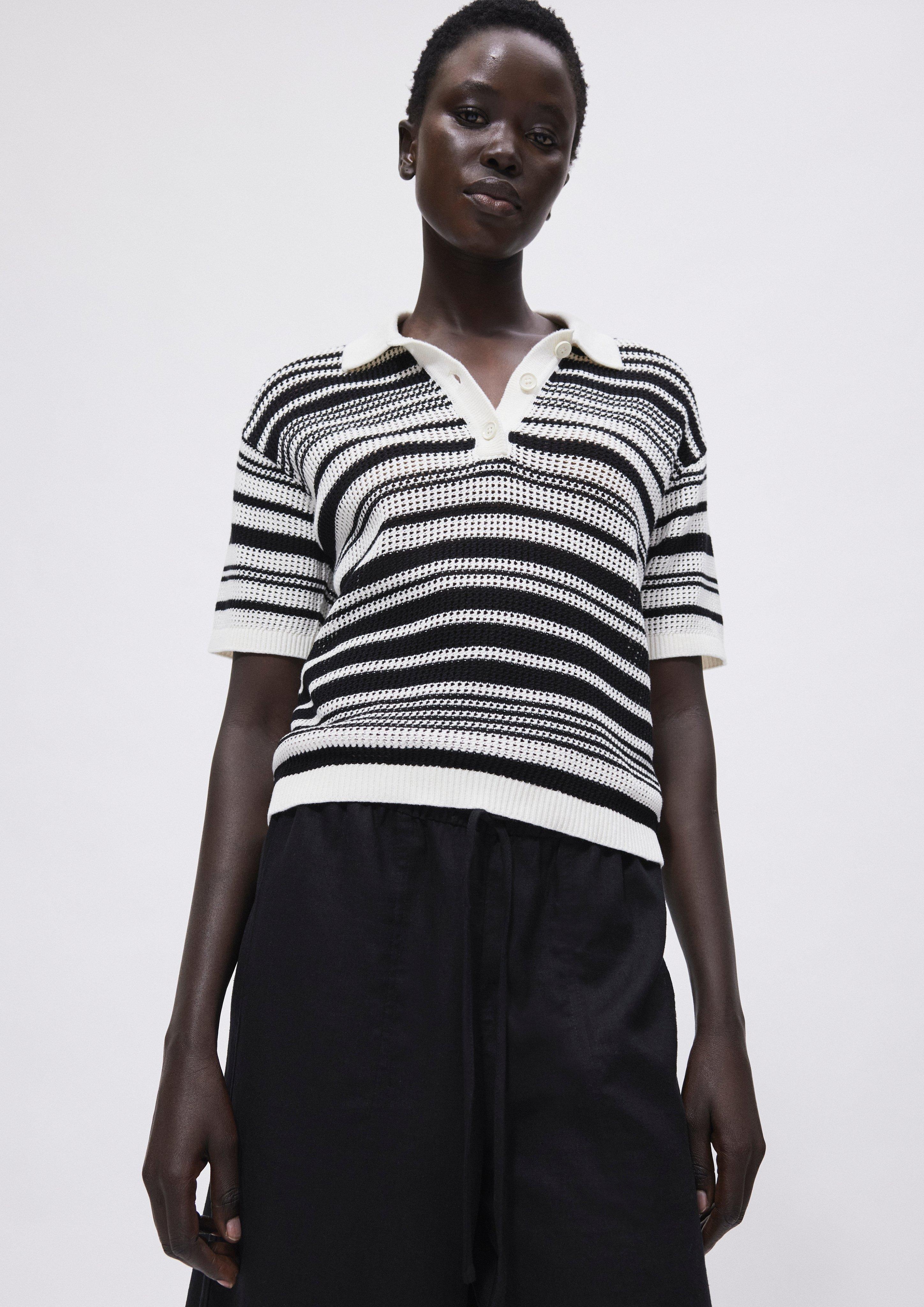 Polo rayé en maille ajourée en blanc de COMMA