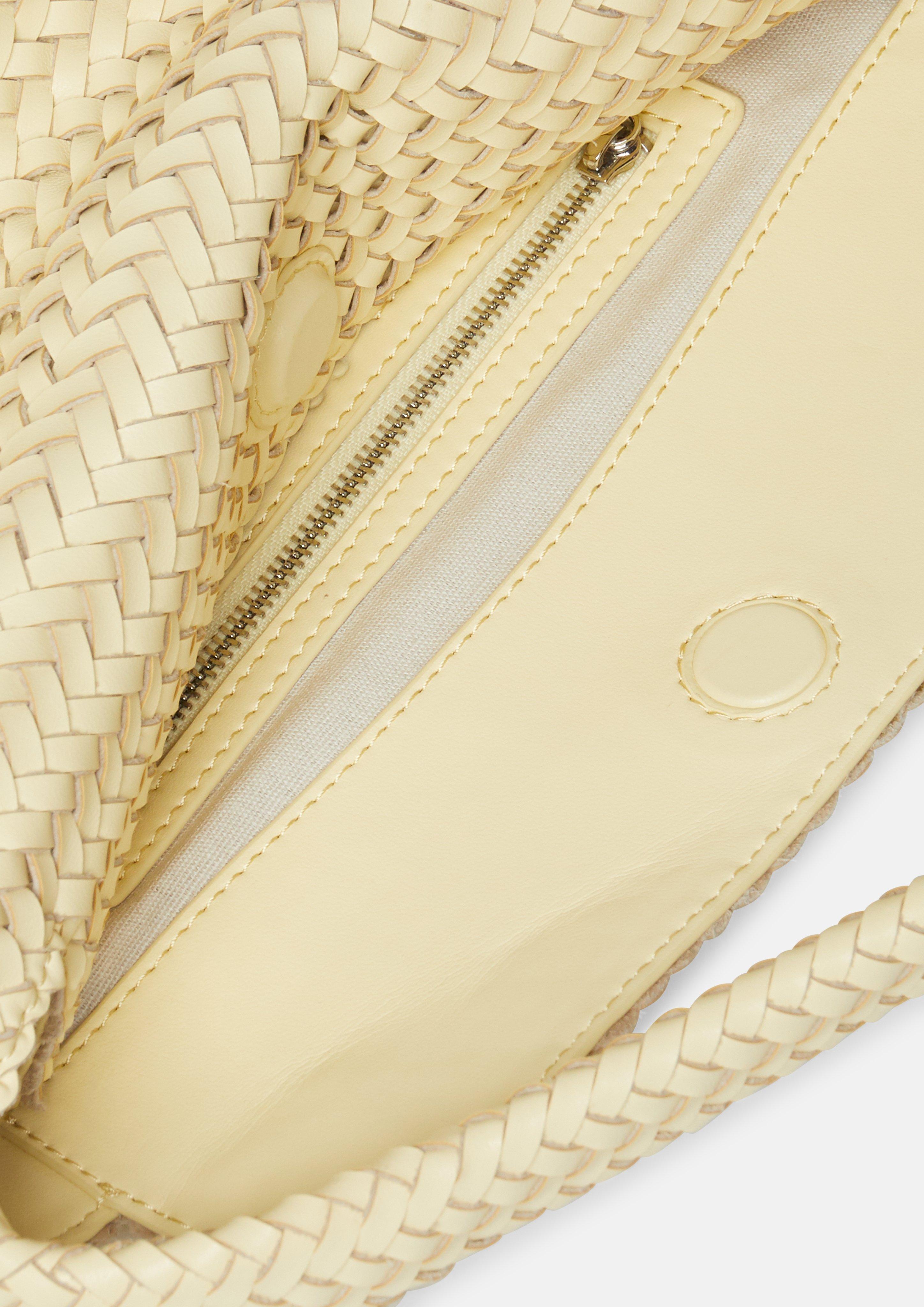 Crossbody bag in braided leather in yellow by COMMA