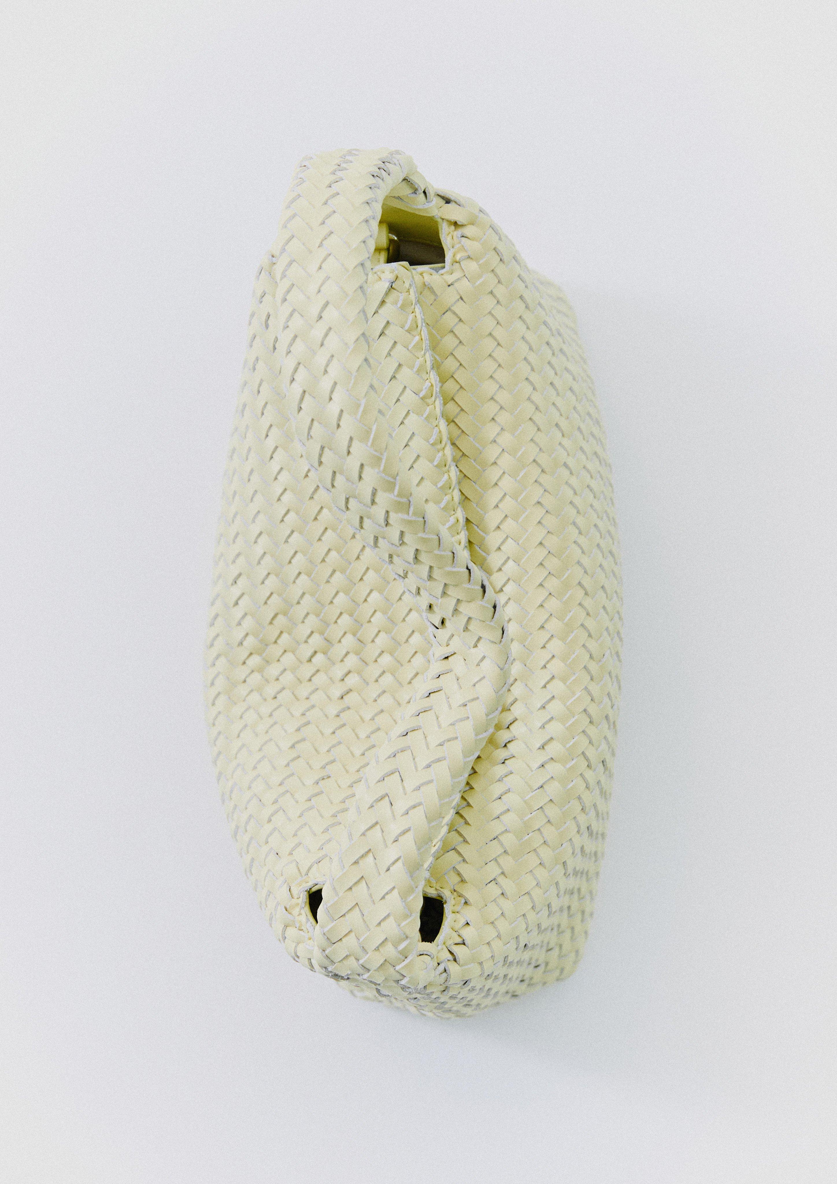 Crossbody bag in braided leather in light yellow by COMMA