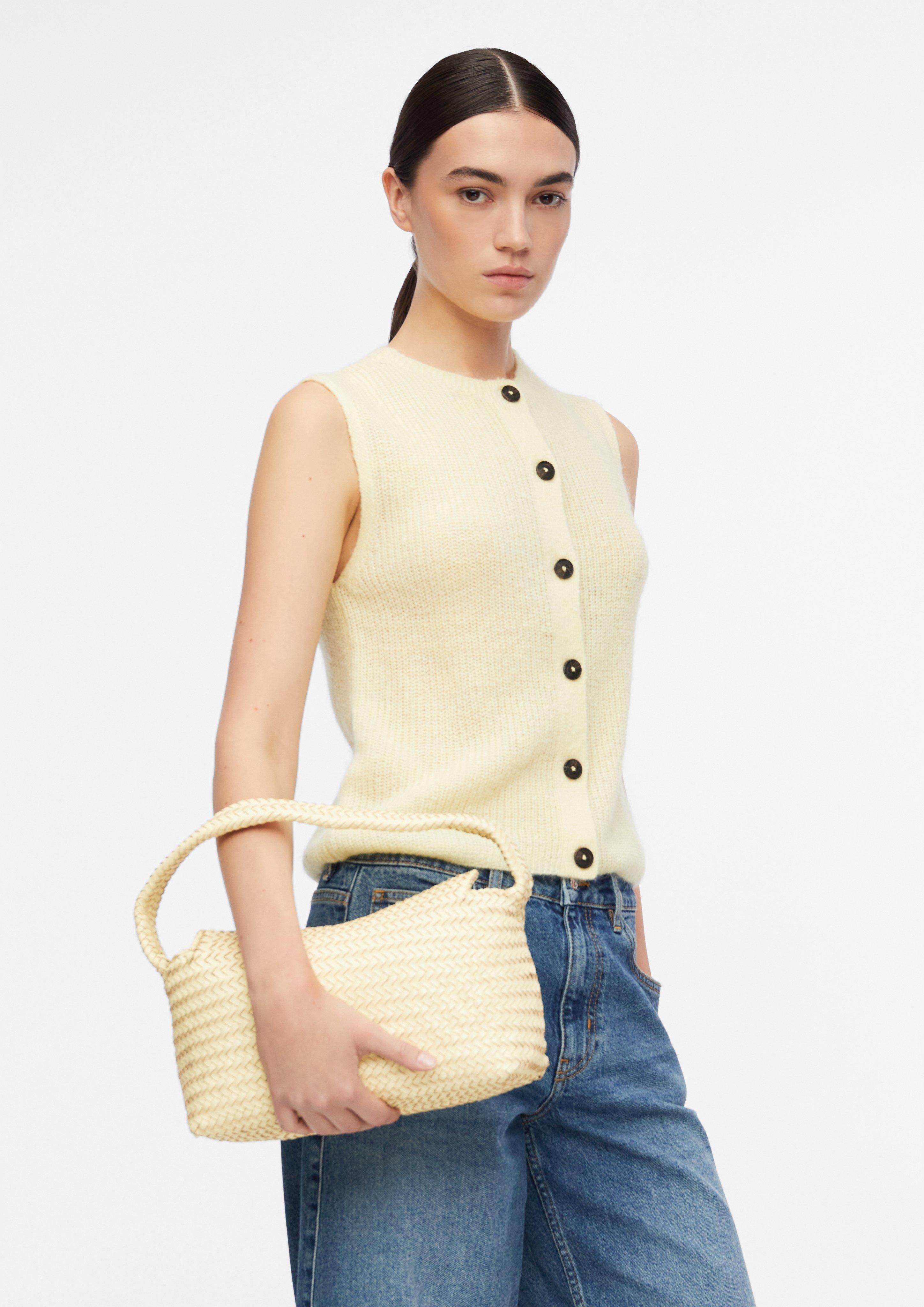 Crossbody bag in braided leather in yellow by COMMA