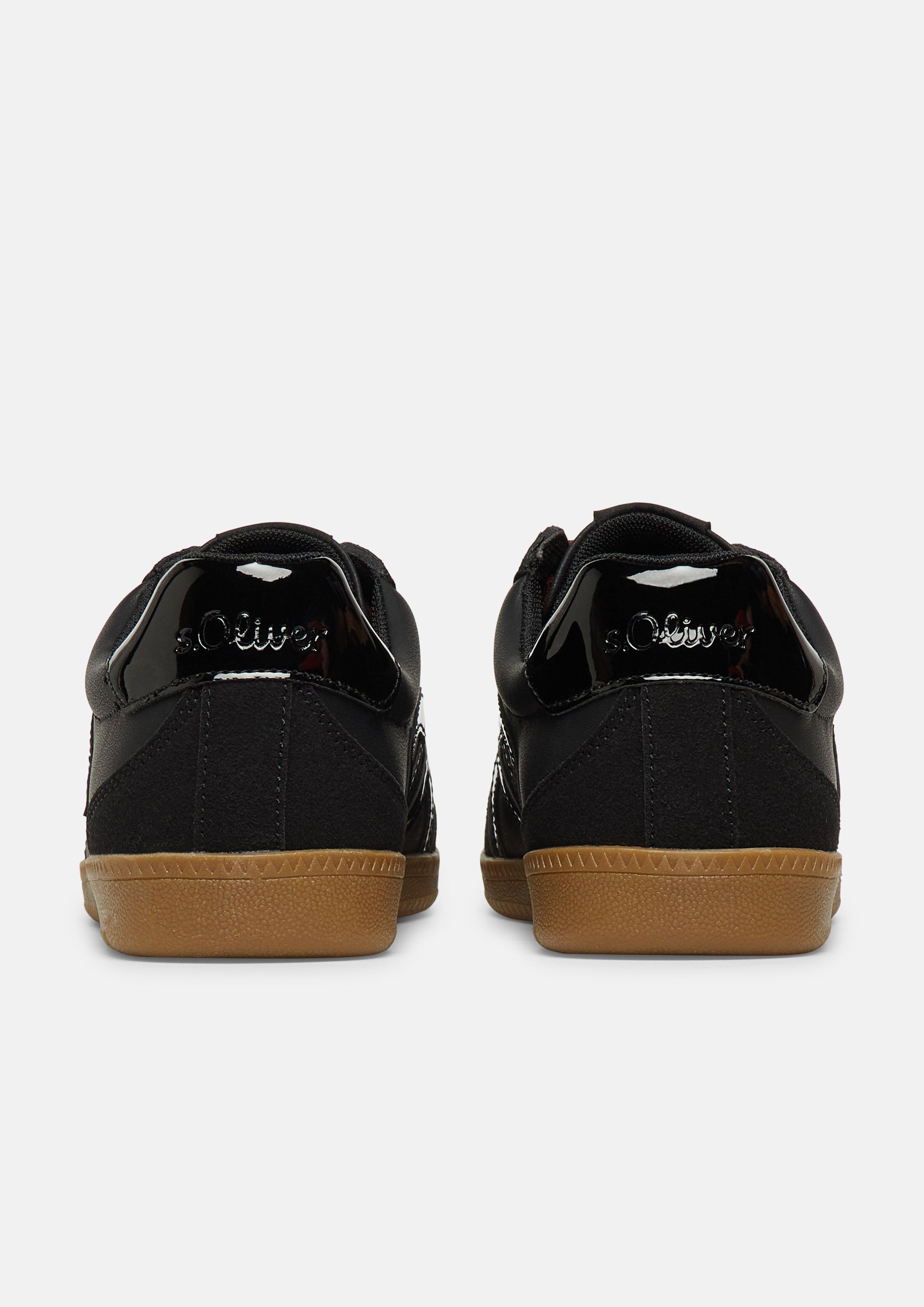 Women Sneakers in black by s.Oliver