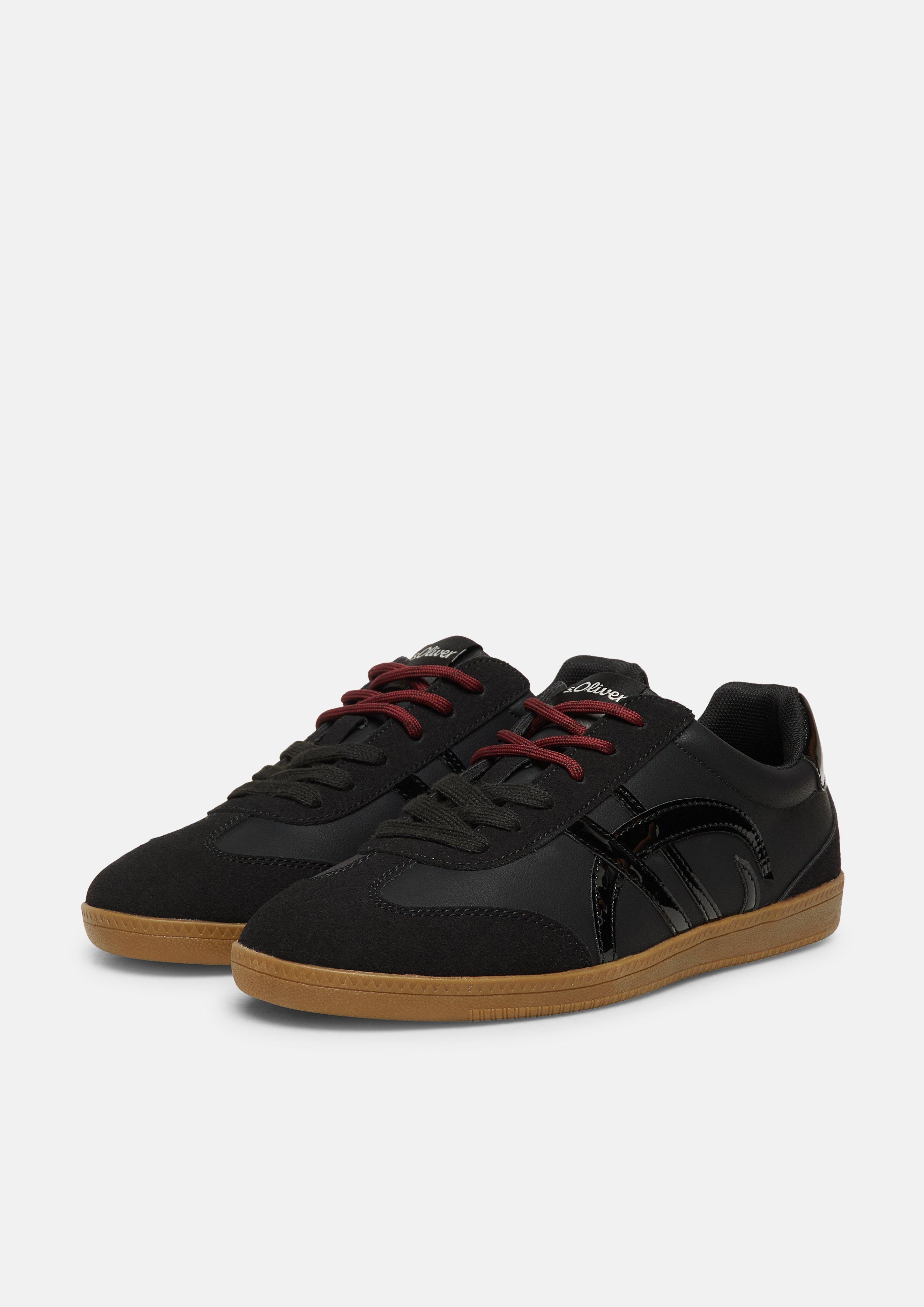 Women Sneakers in black by s.Oliver