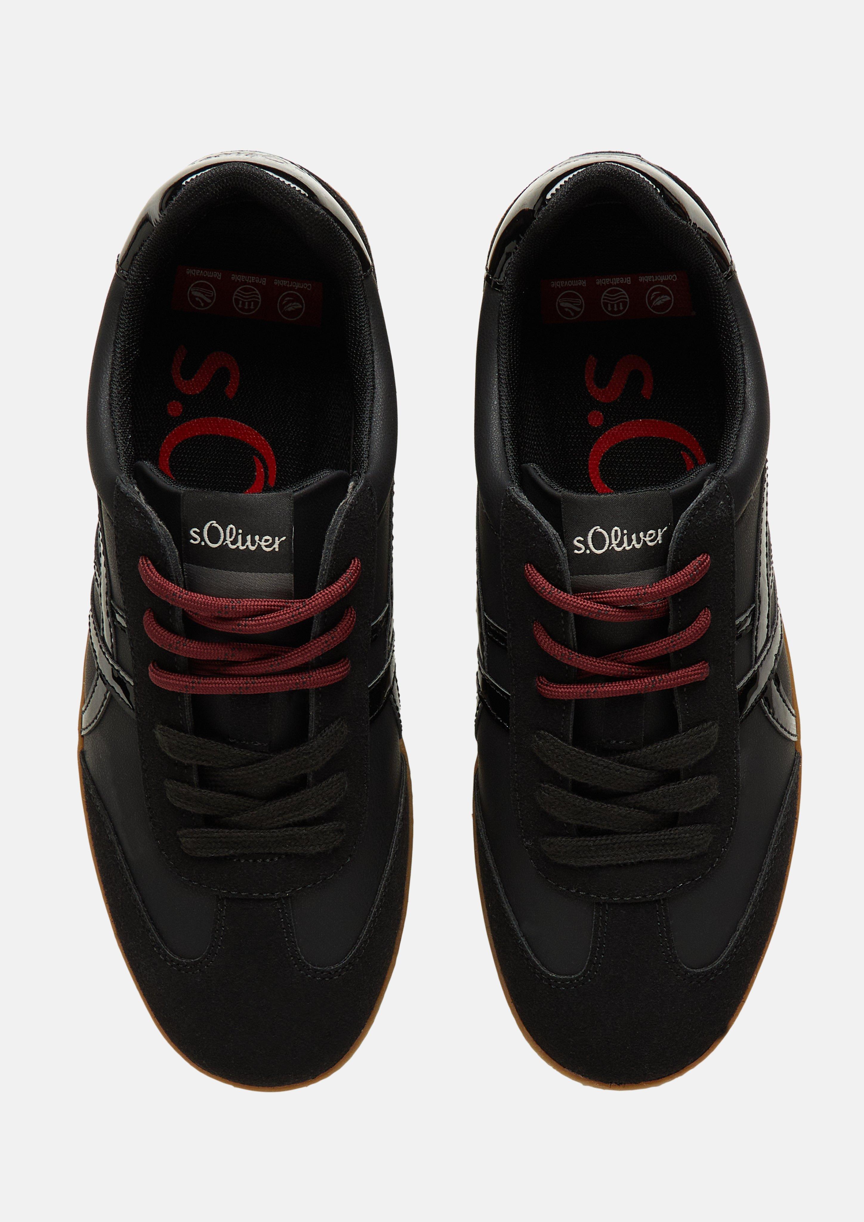 Women Sneakers in black by s.Oliver