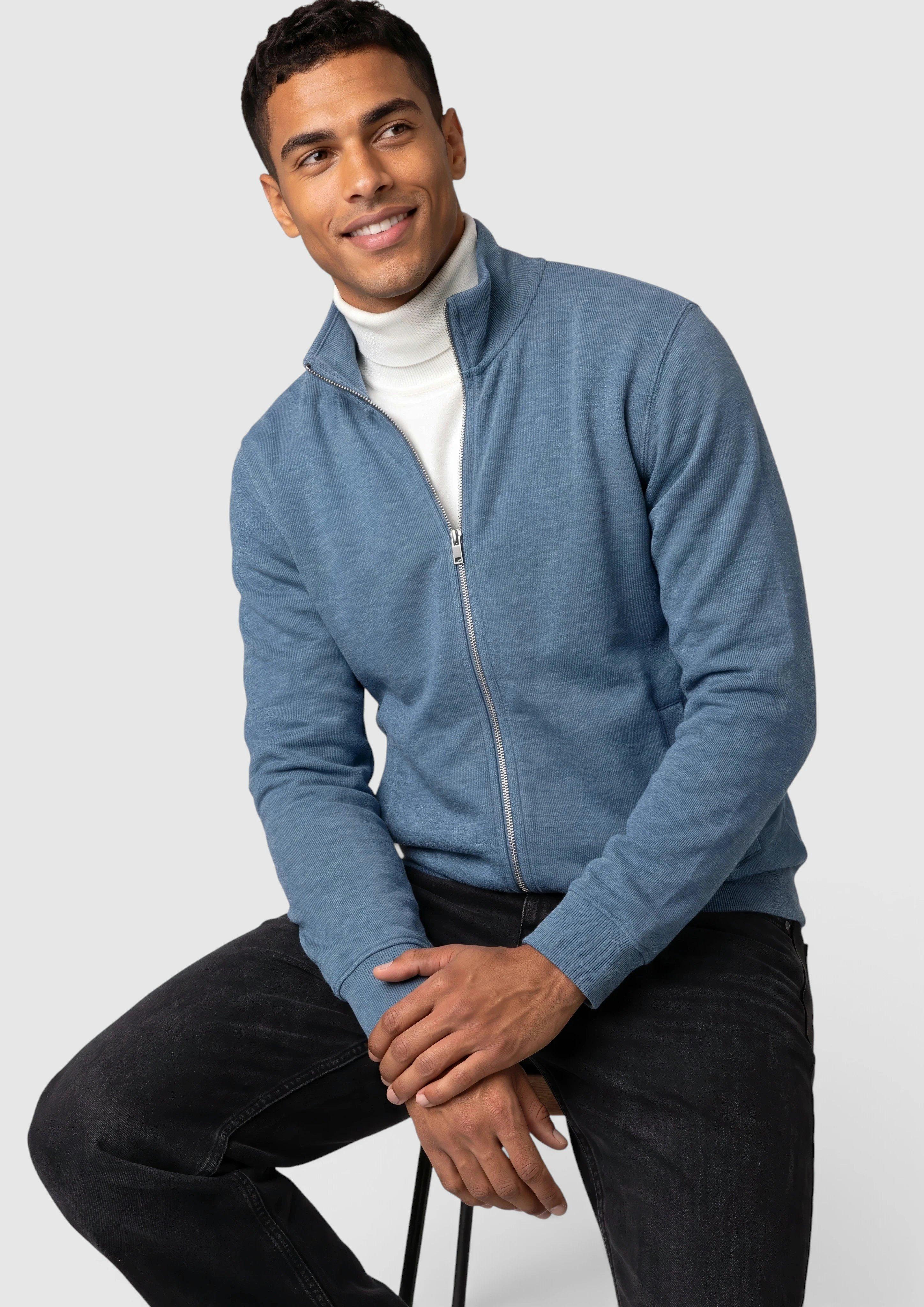 Veste de survêtement chinée avec poches latérales en bleu ciel de s.Oliver
