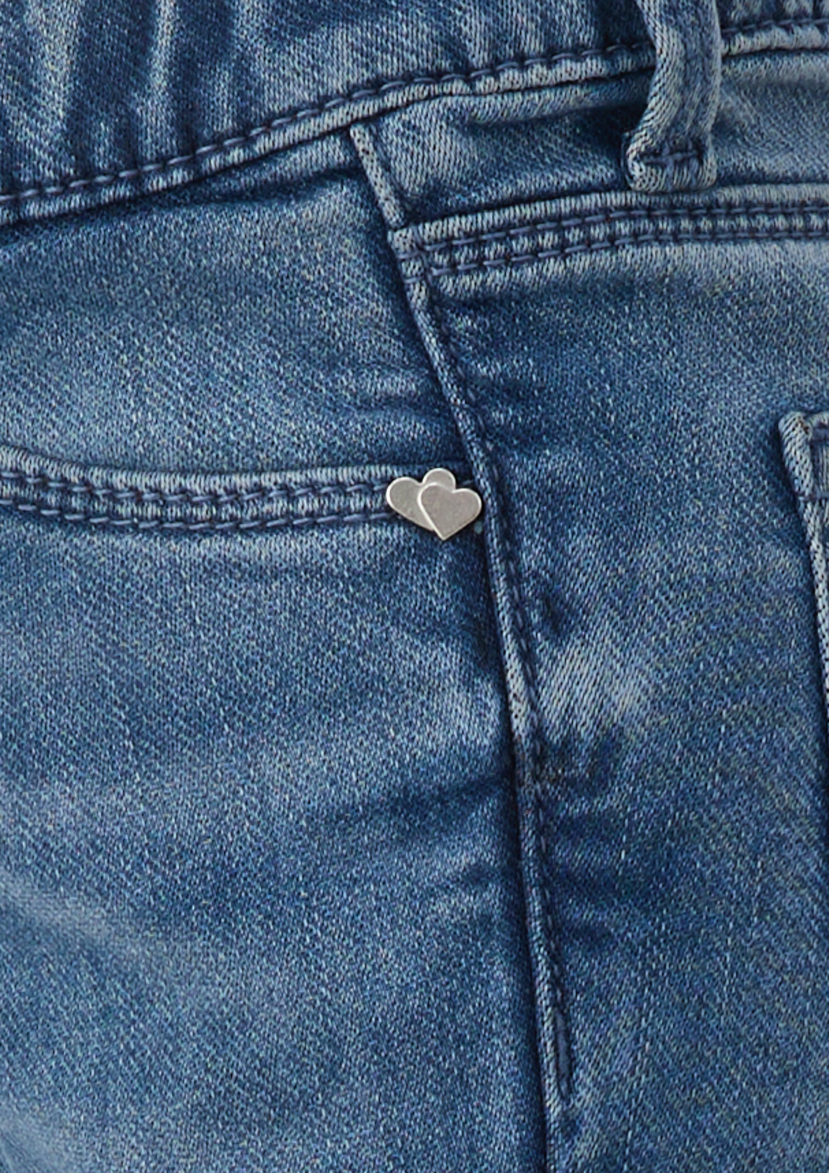Kids Betsy Jeans / Regular Fit / Mid Rise / Flared Leg / Soft &amp; Warm in blue by s.Oliver