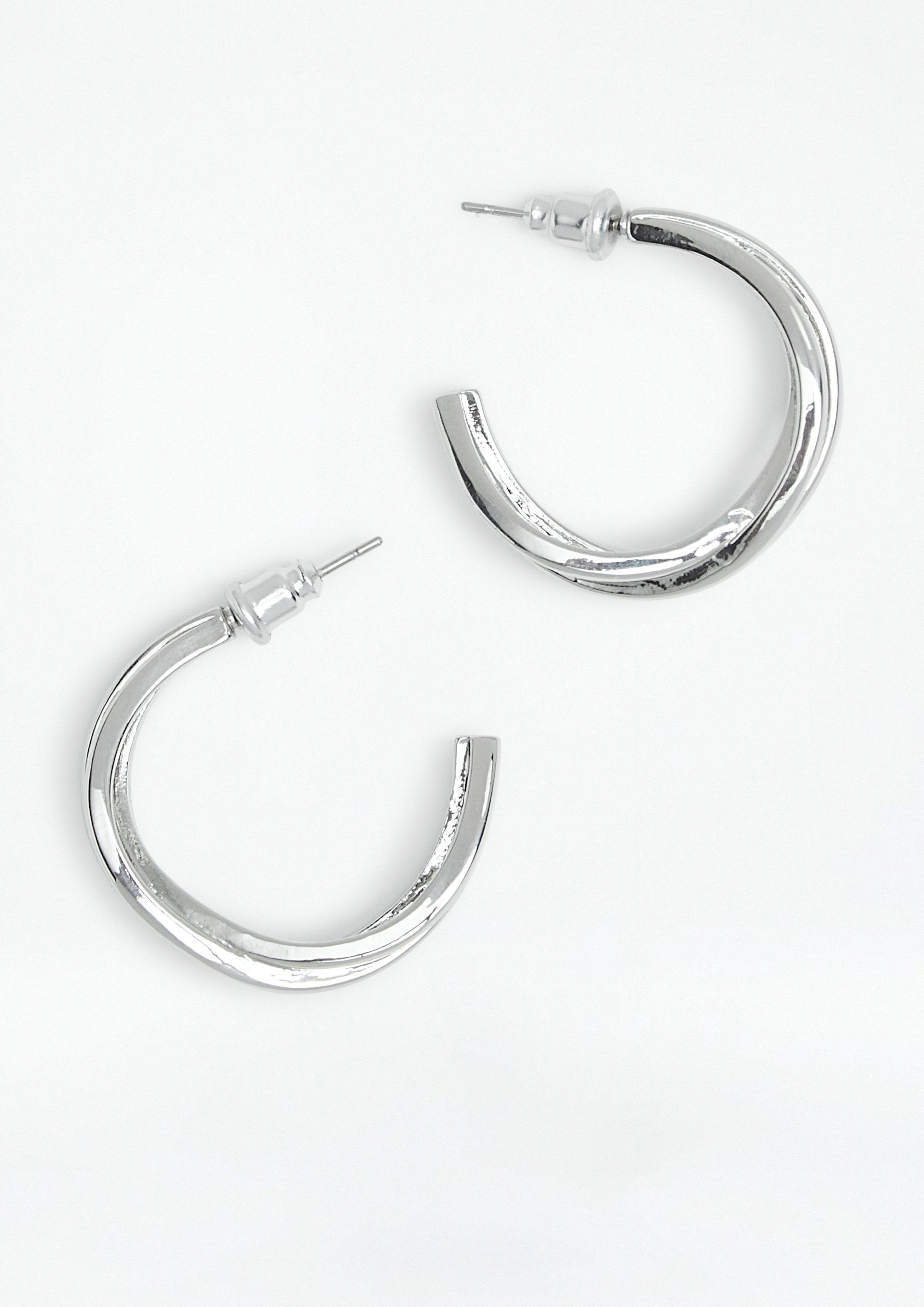 Fashion Earrings in silver by COMMA