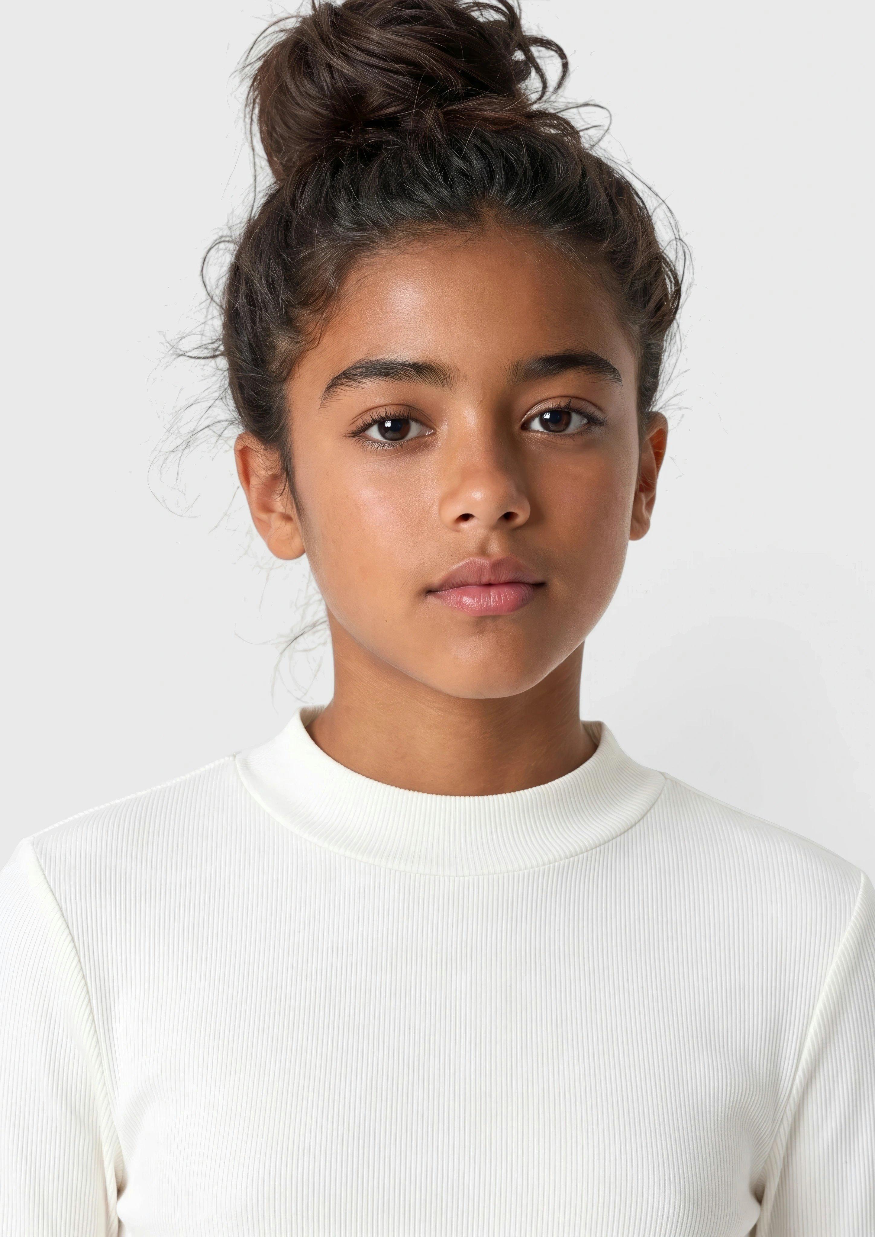 Junior T-shirt côtelé coupe ajustée avec ourlet ondulé en crème de s.Oliver
