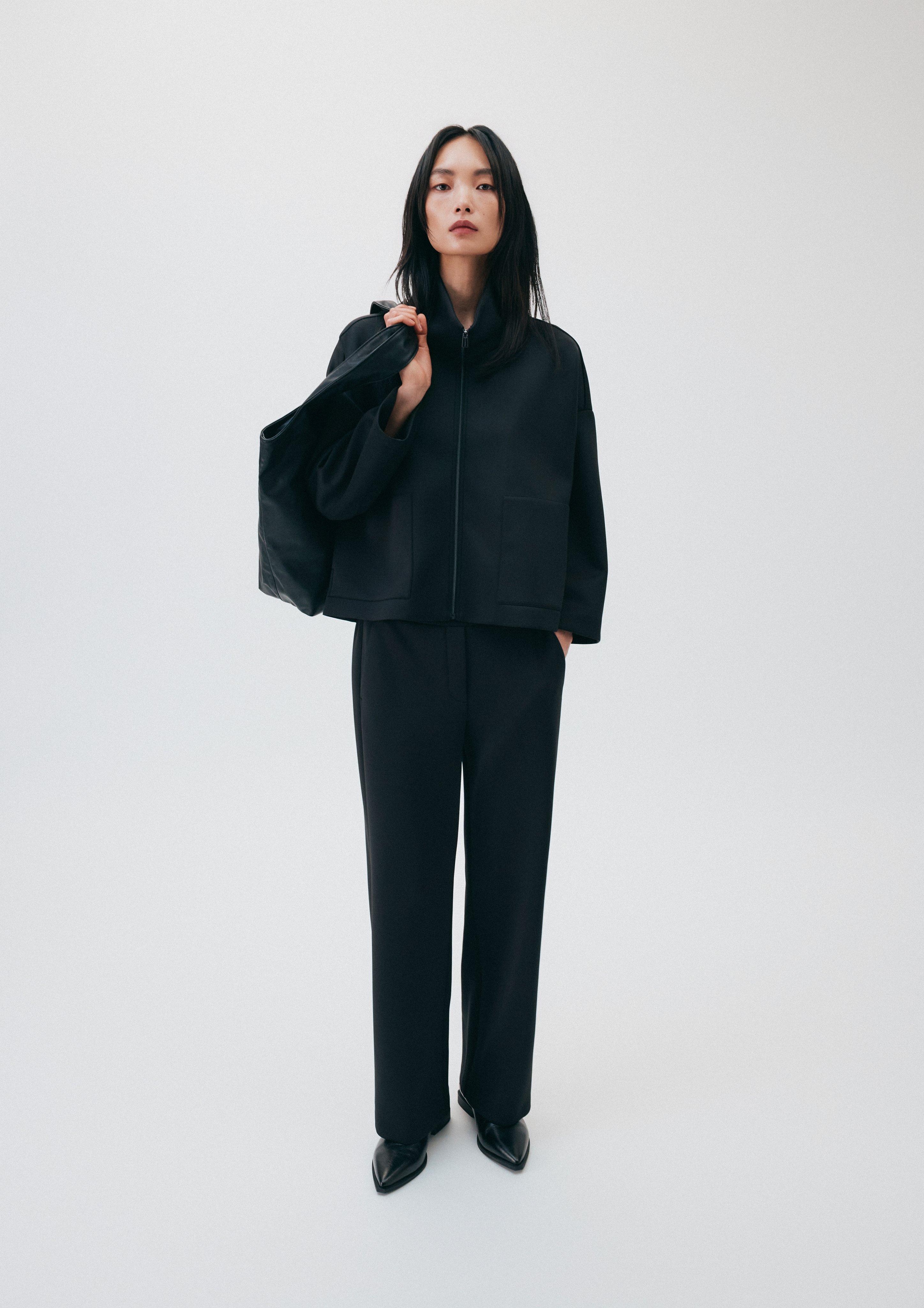 Trousers in black by COMMA