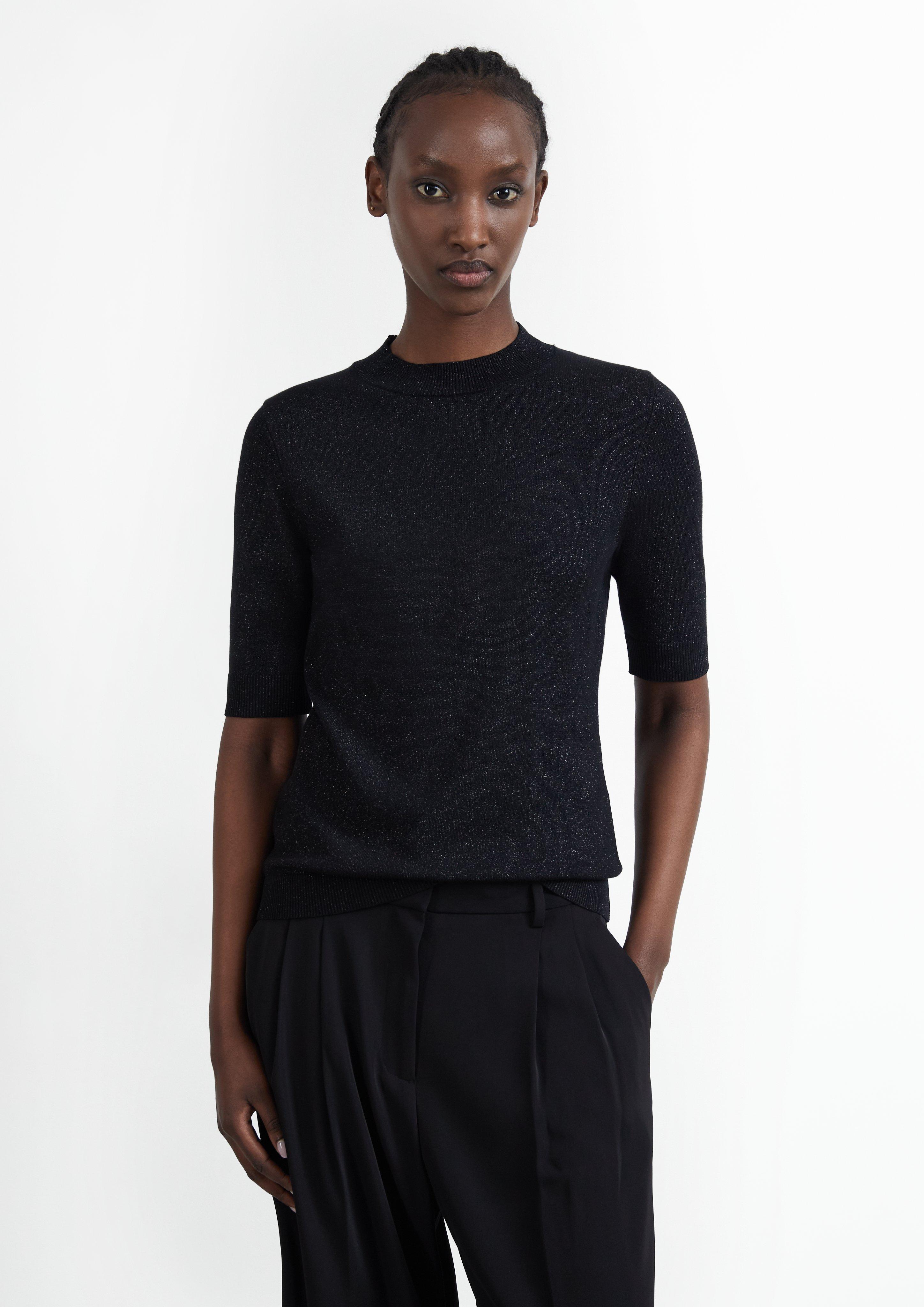 Pull à manches courtes en fil pailleté et col montant en noir de COMMA
