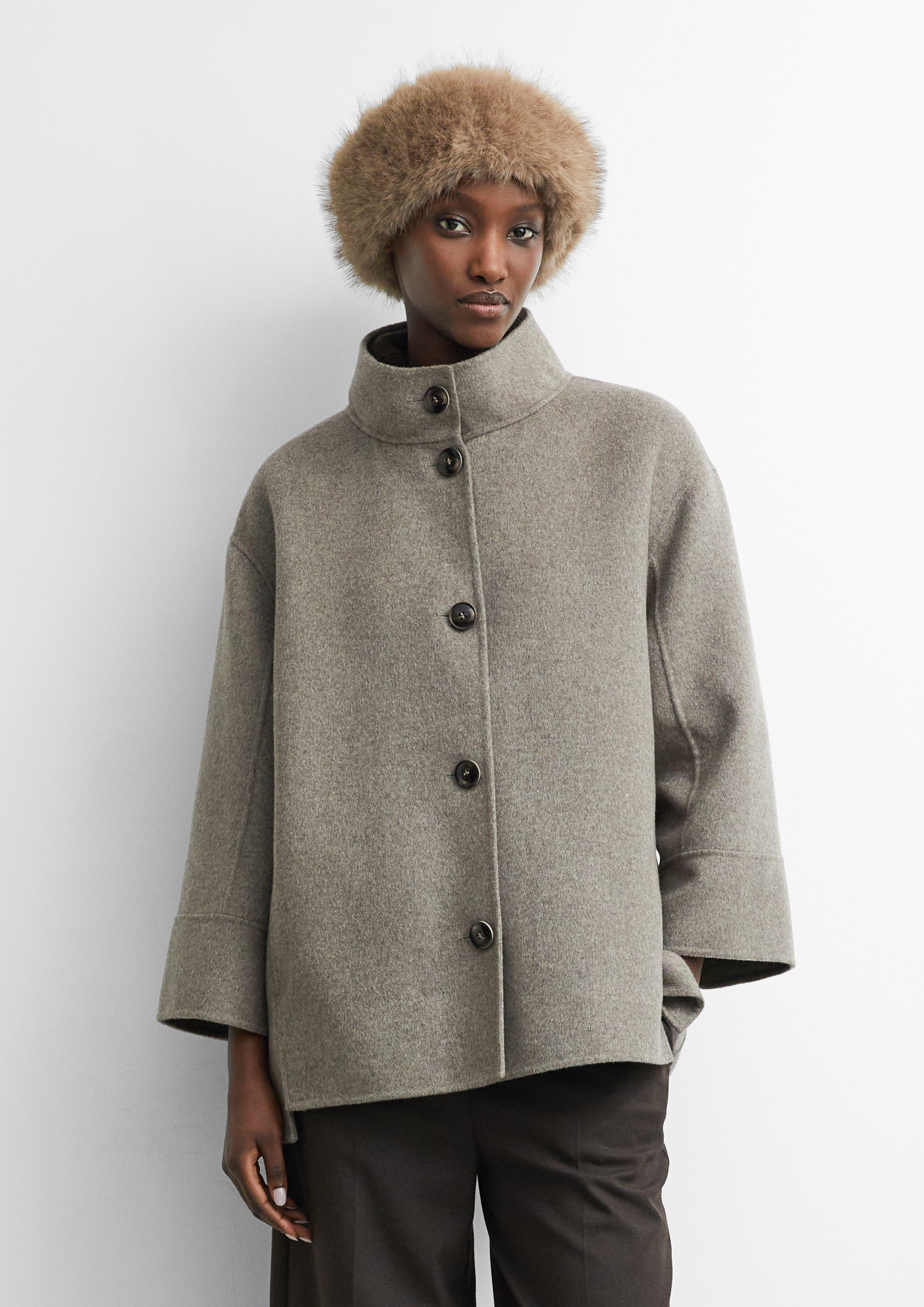 Cap in beige by COMMA