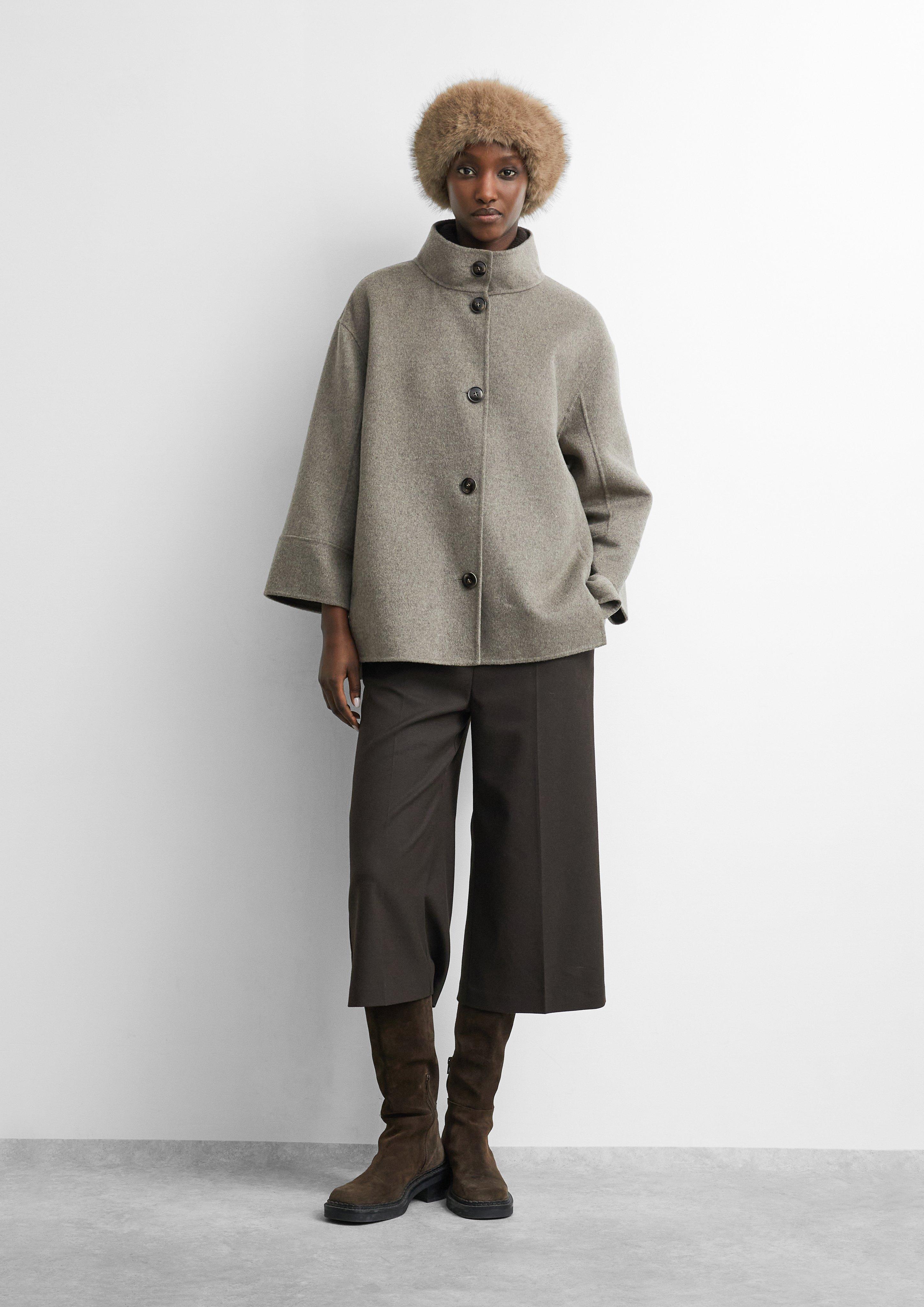 Cap in beige by COMMA