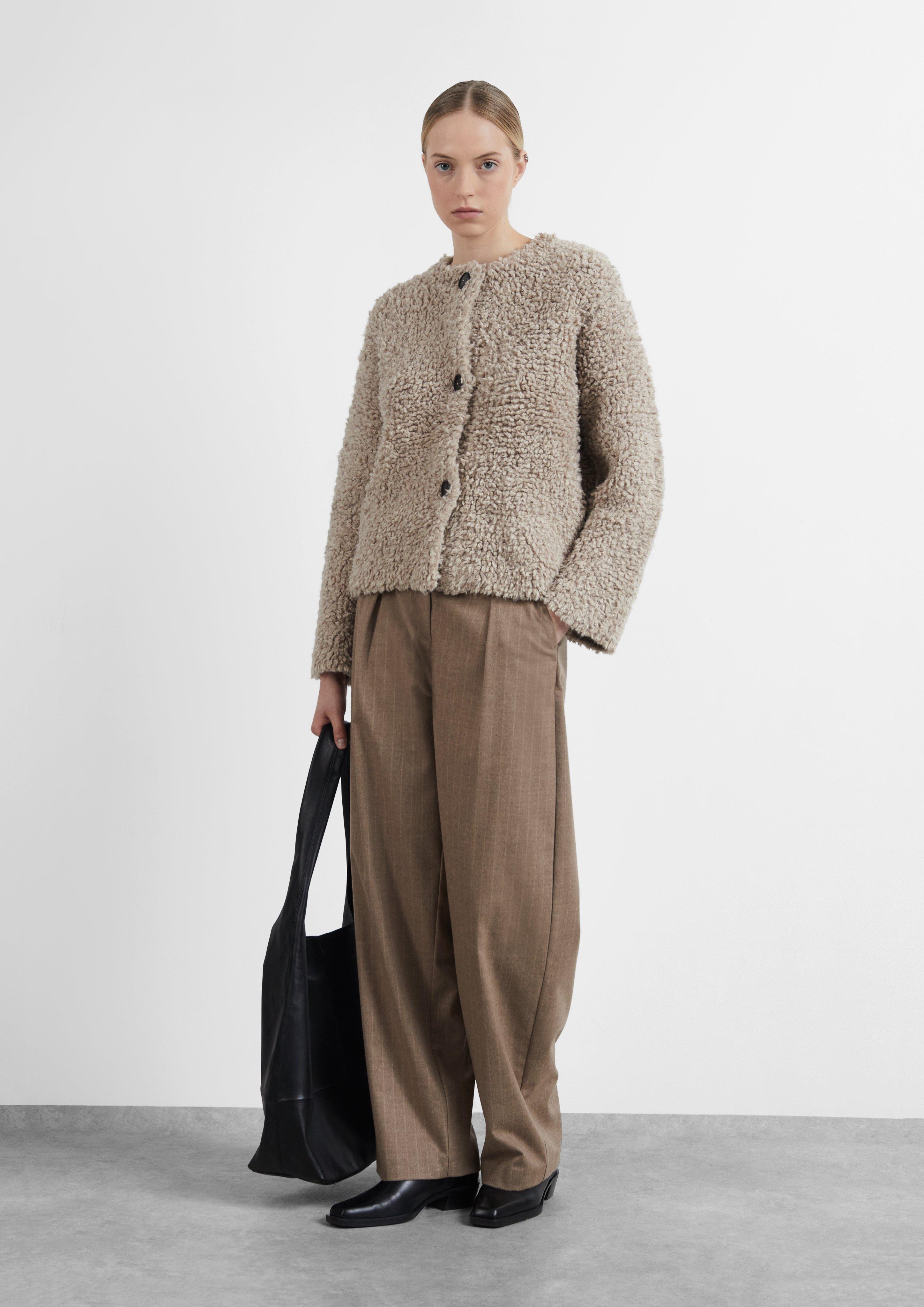 Veste en tricot en brun de COMMA