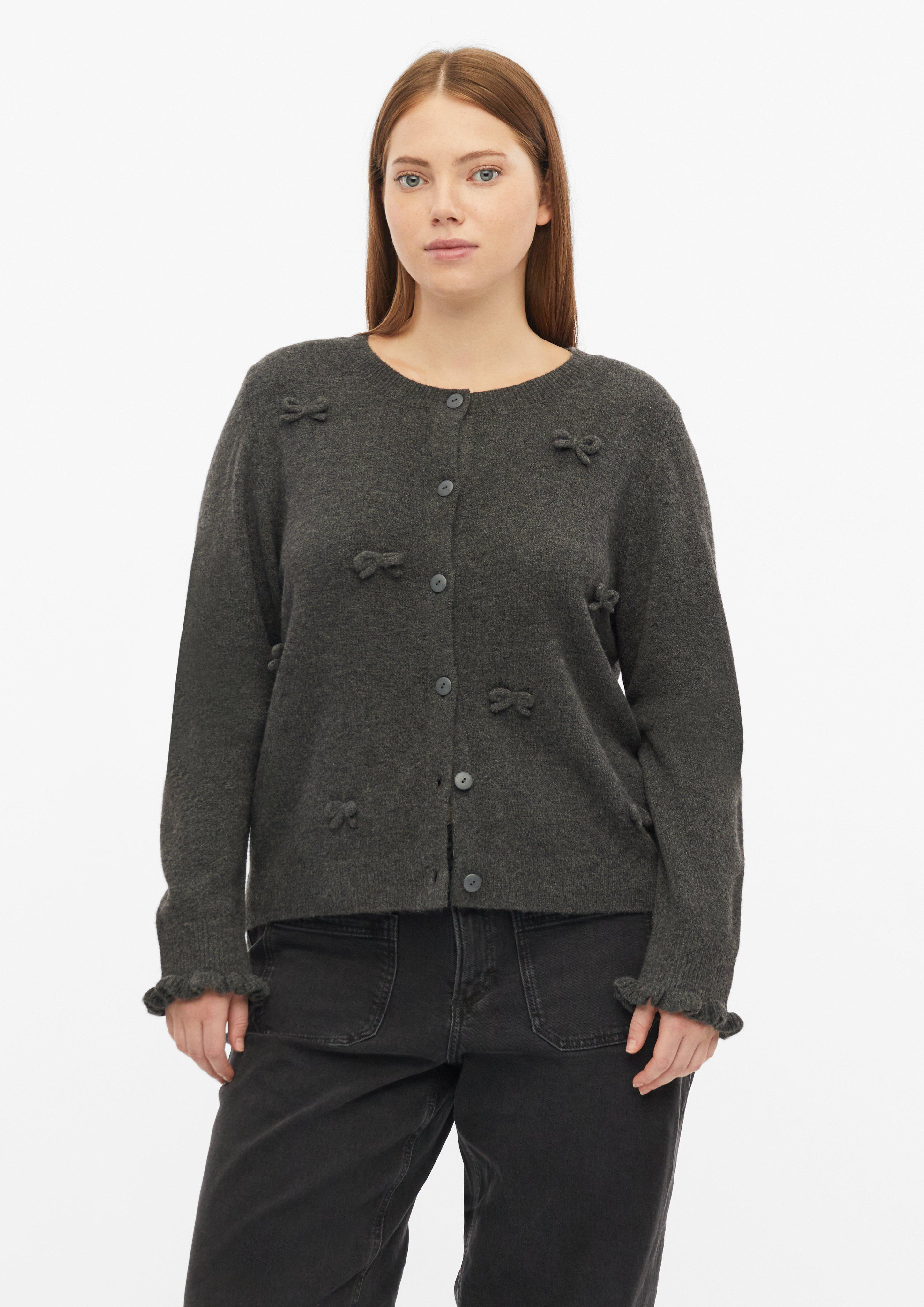Gebreid vest met strikken