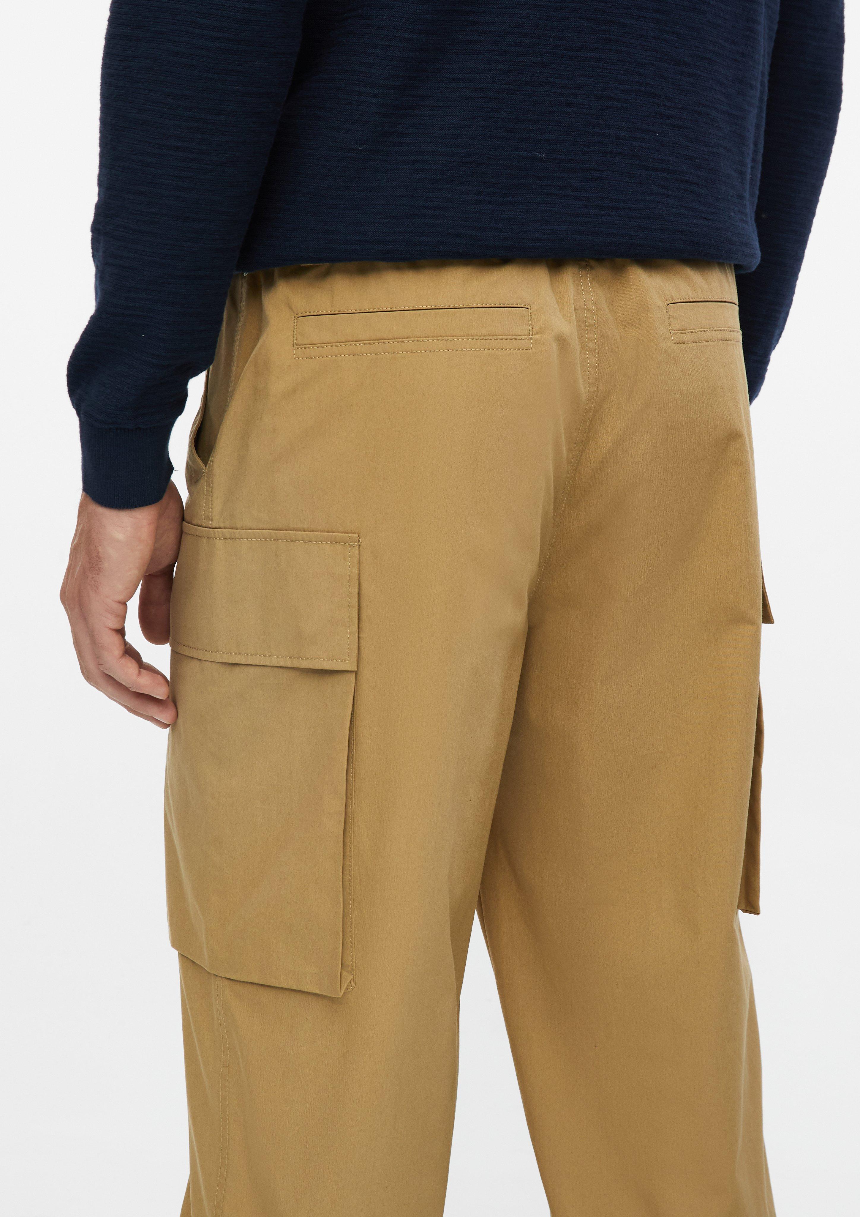 Men Trousers in yellow by s.Oliver