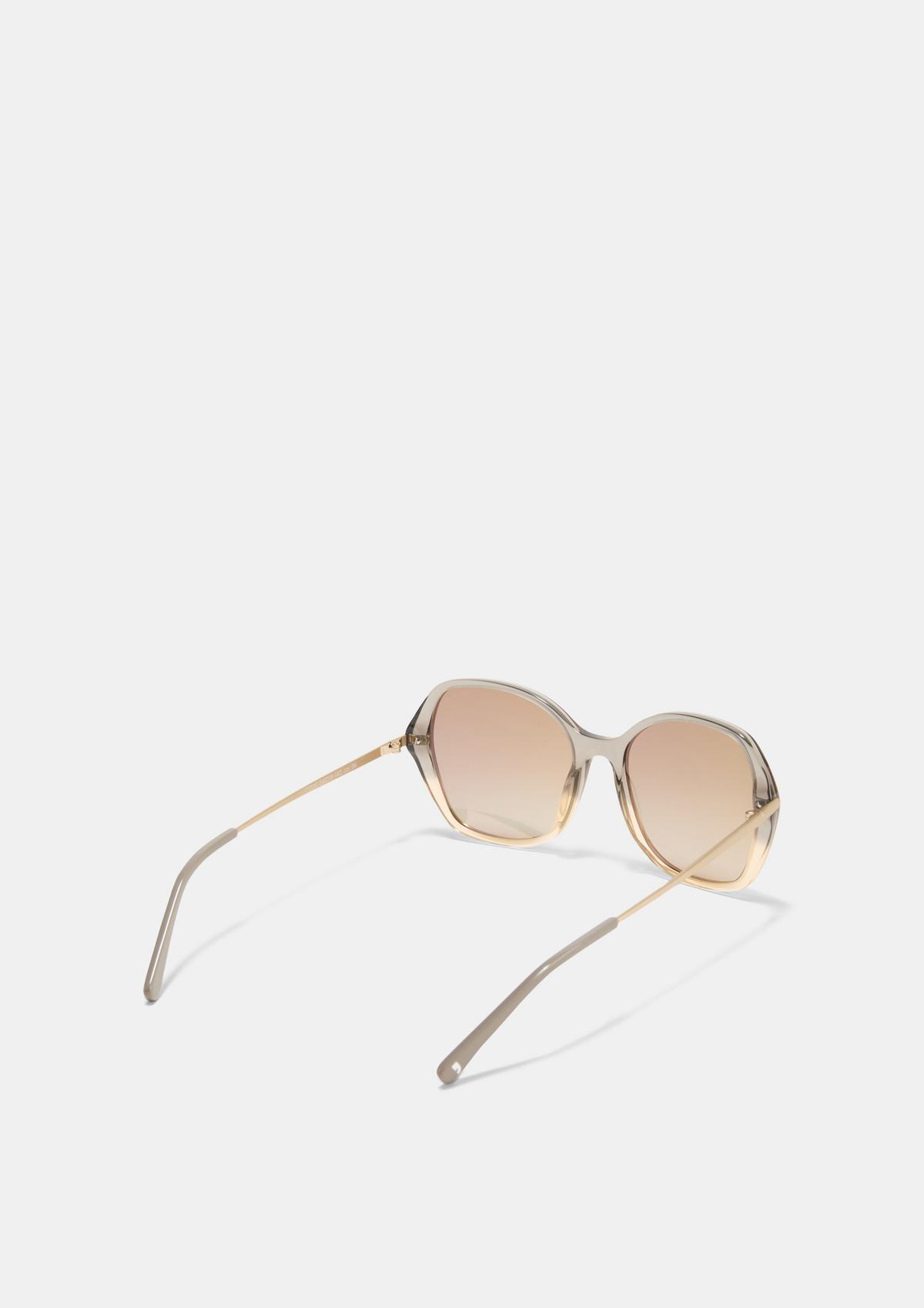 comma Sonnenbrille mit durchsichtigem Rahmen