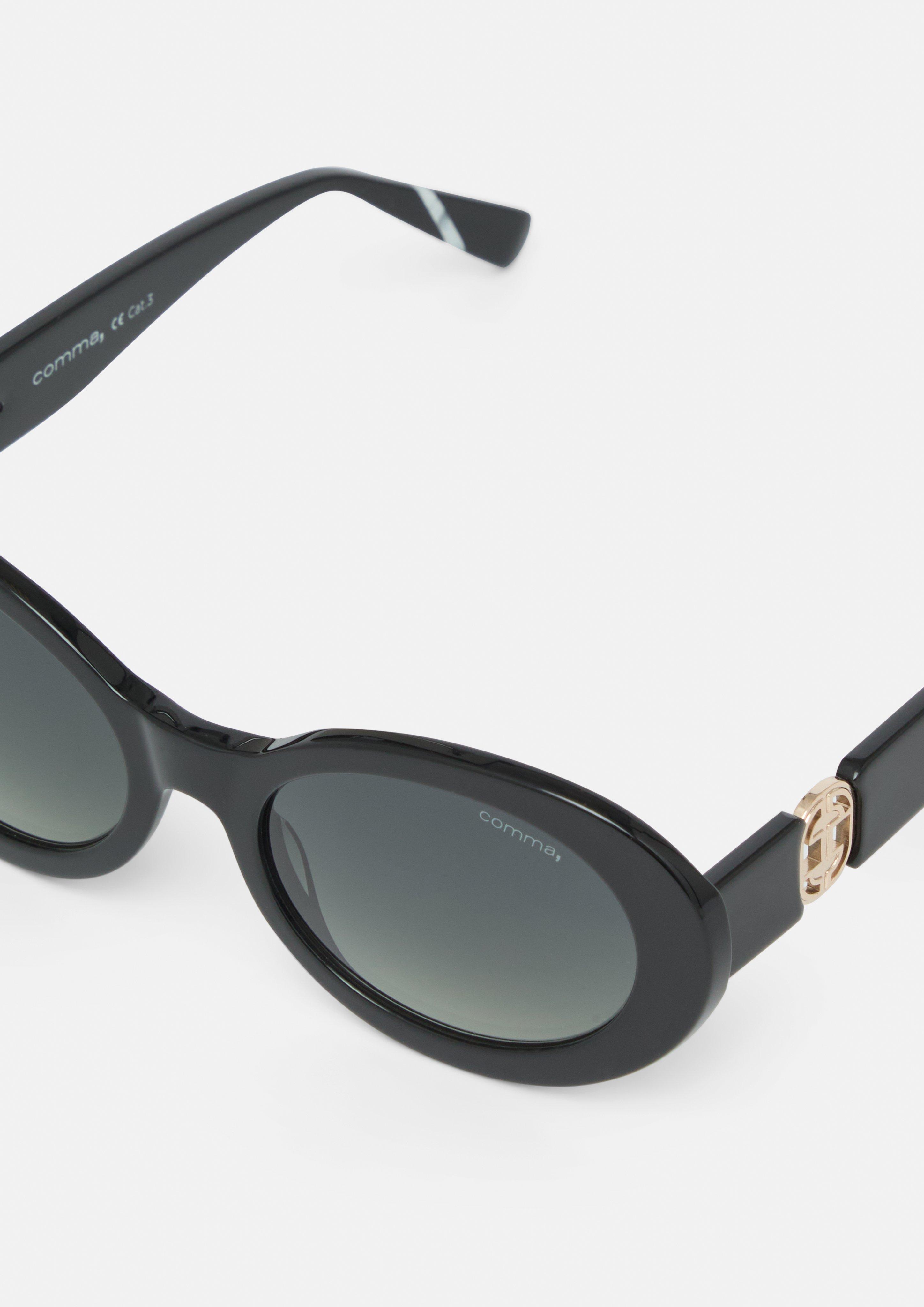 Ovale Sonnenbrille mit Schmuckdetail am Bügel in schwarz von COMMA