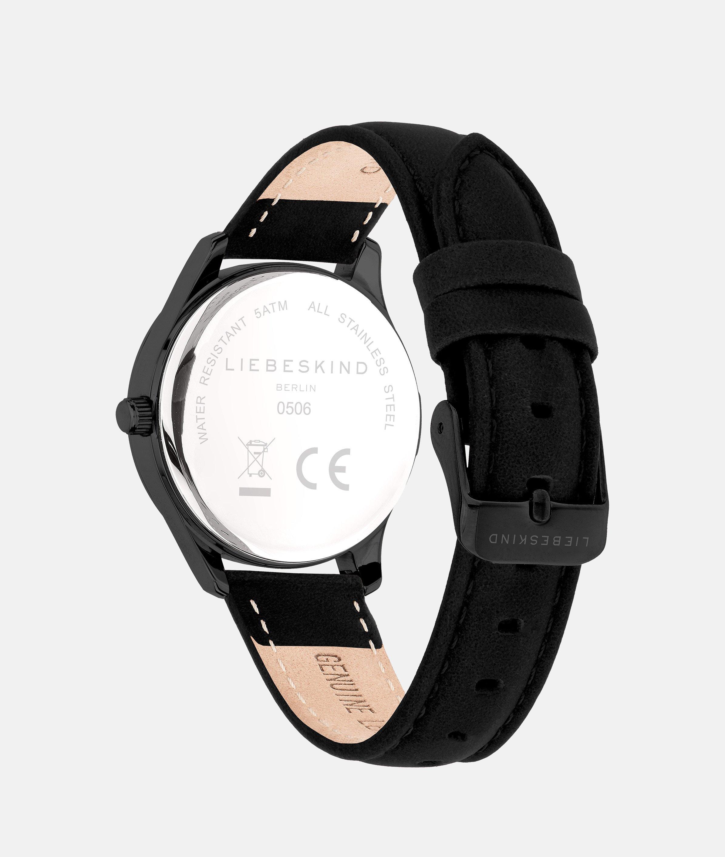 Klok in zwart, goud & goud