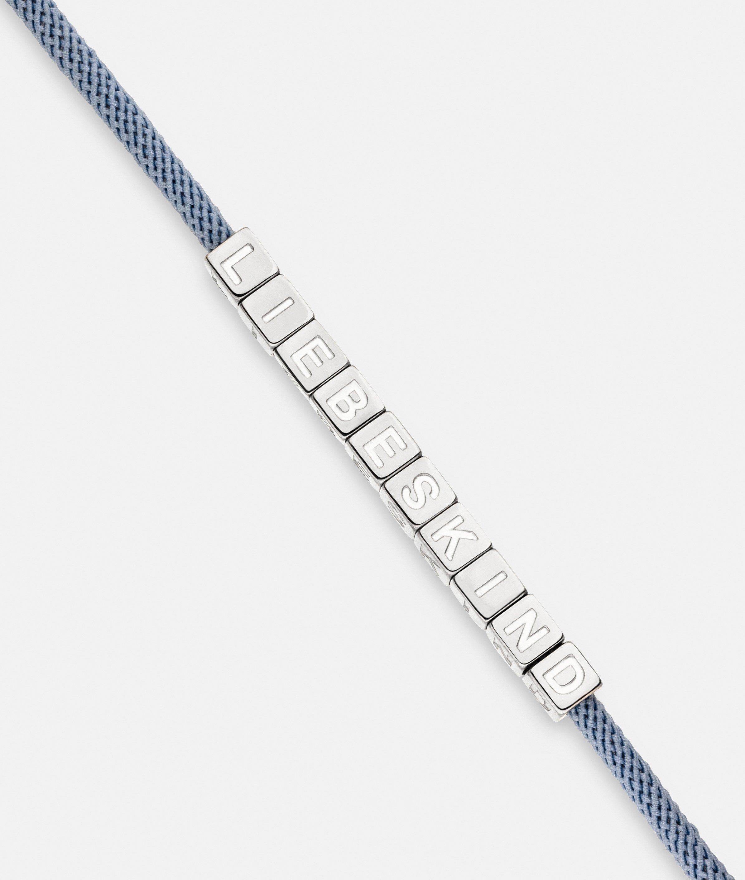 Armband in blau, gold & silber