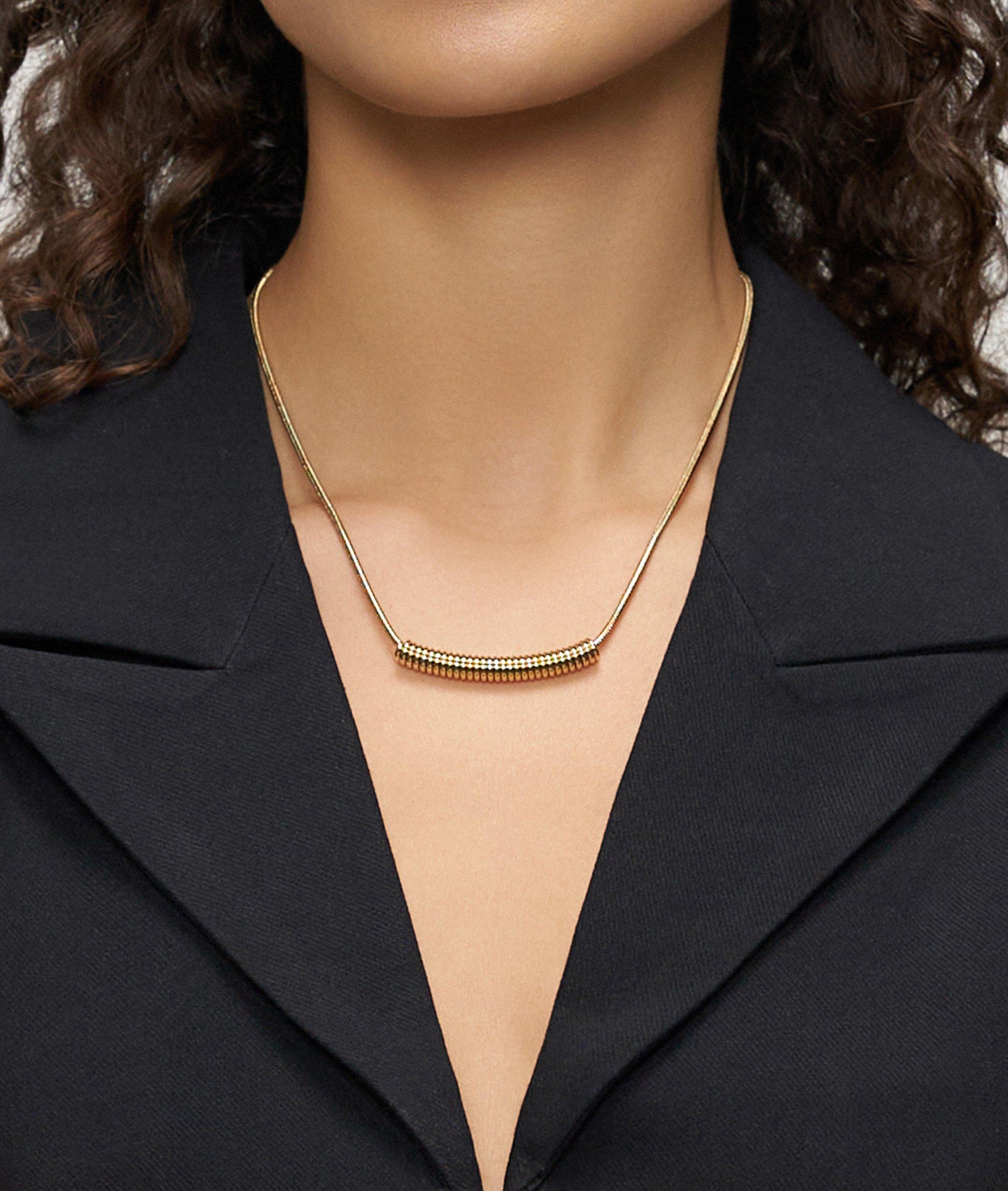 Halskette in gold, silber & schwarz