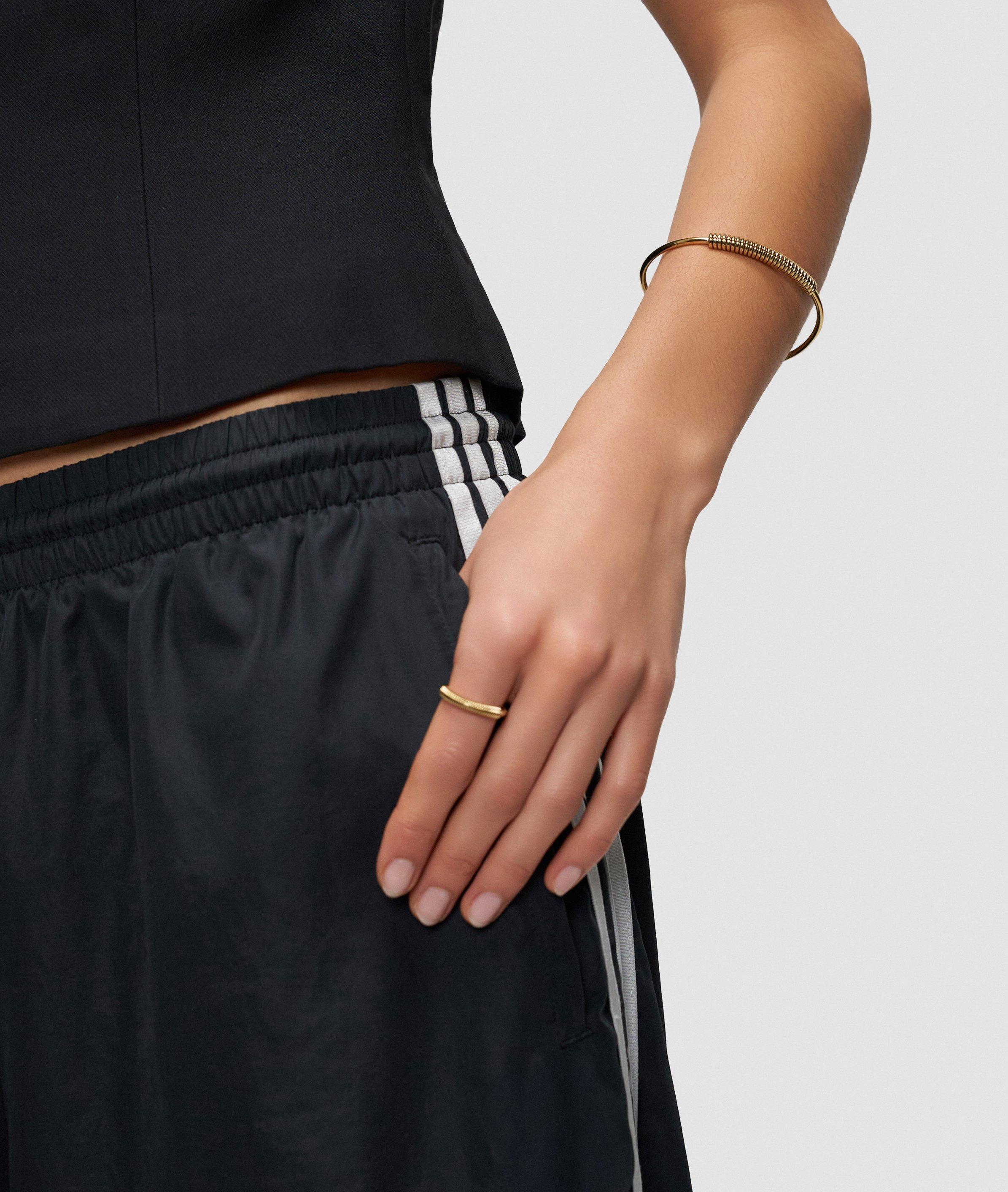 Armreif in gold, schwarz & silber