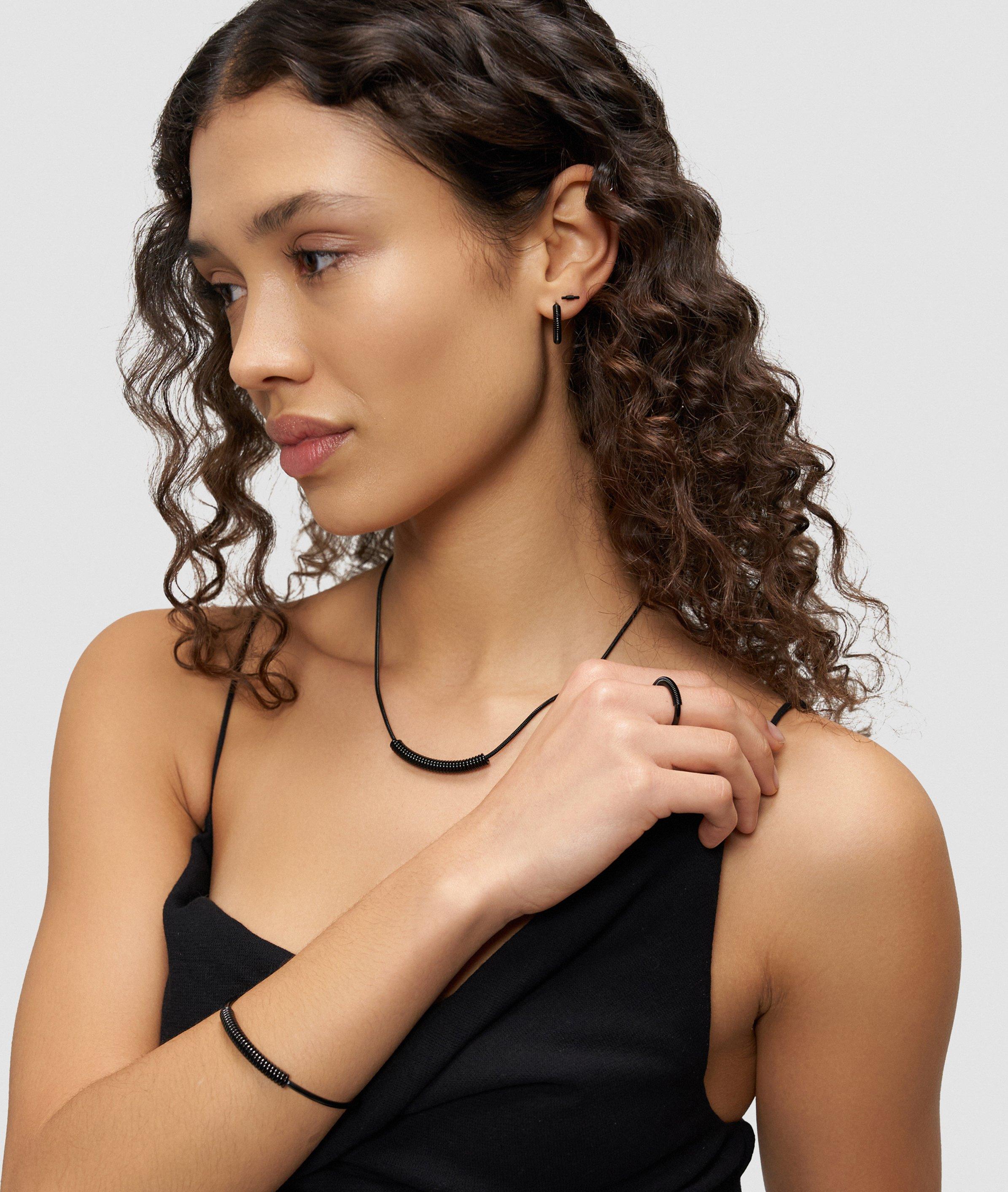 Armreif in schwarz, gold & silber