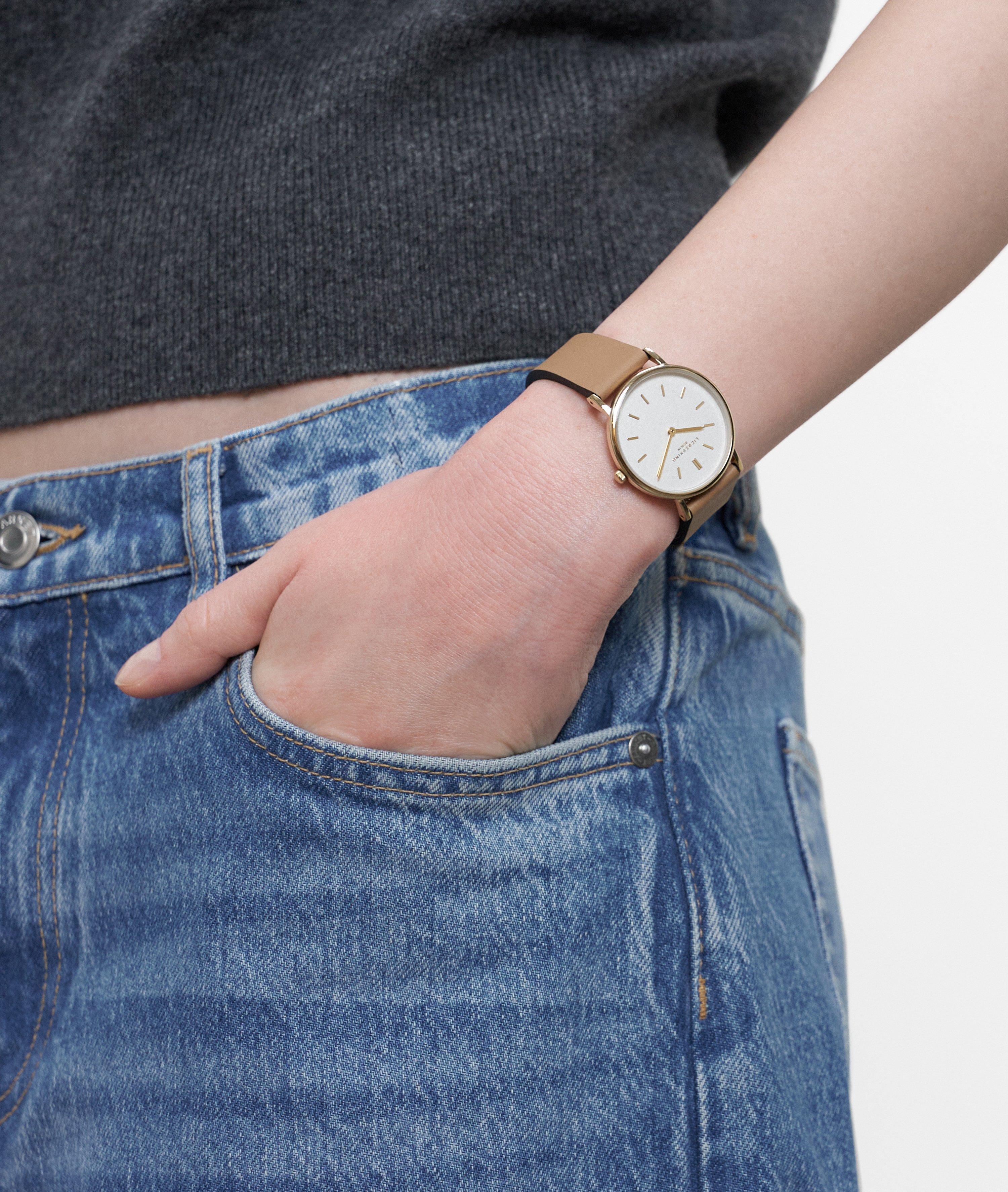 Uhr in gold, braun, grau & schwarz