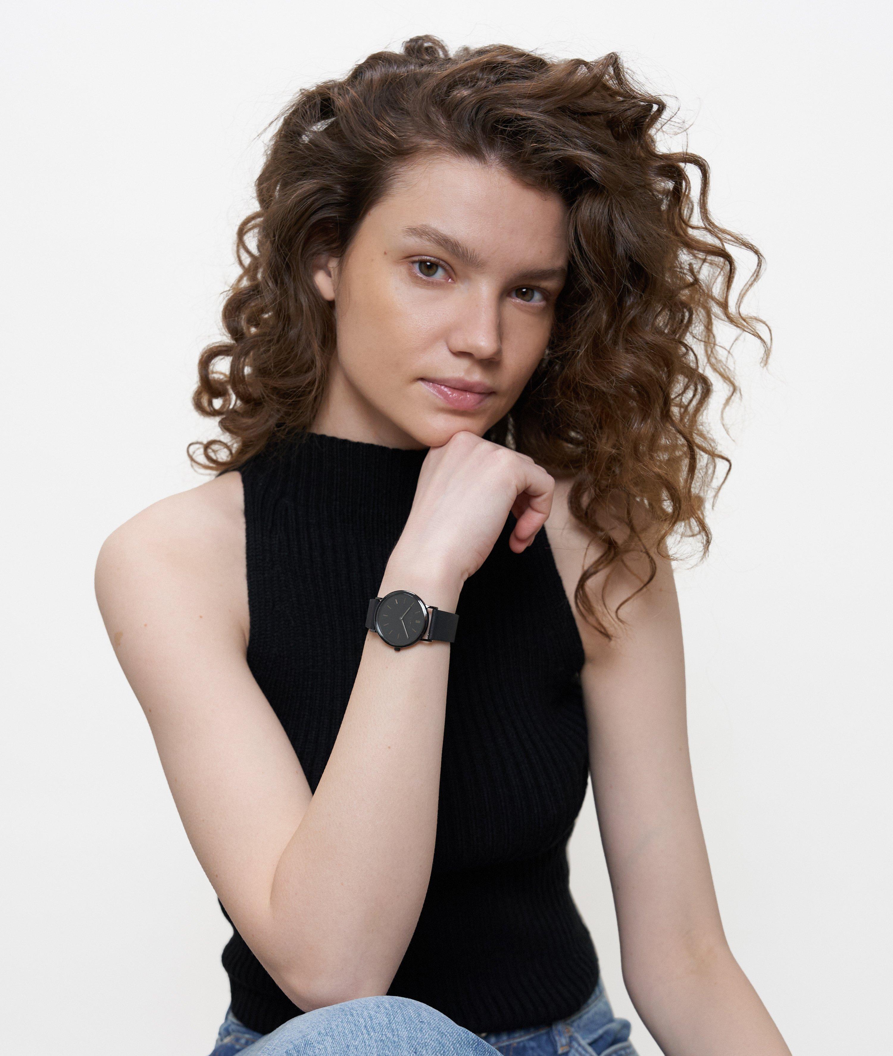 Uhr in schwarz, braun, gold & grau