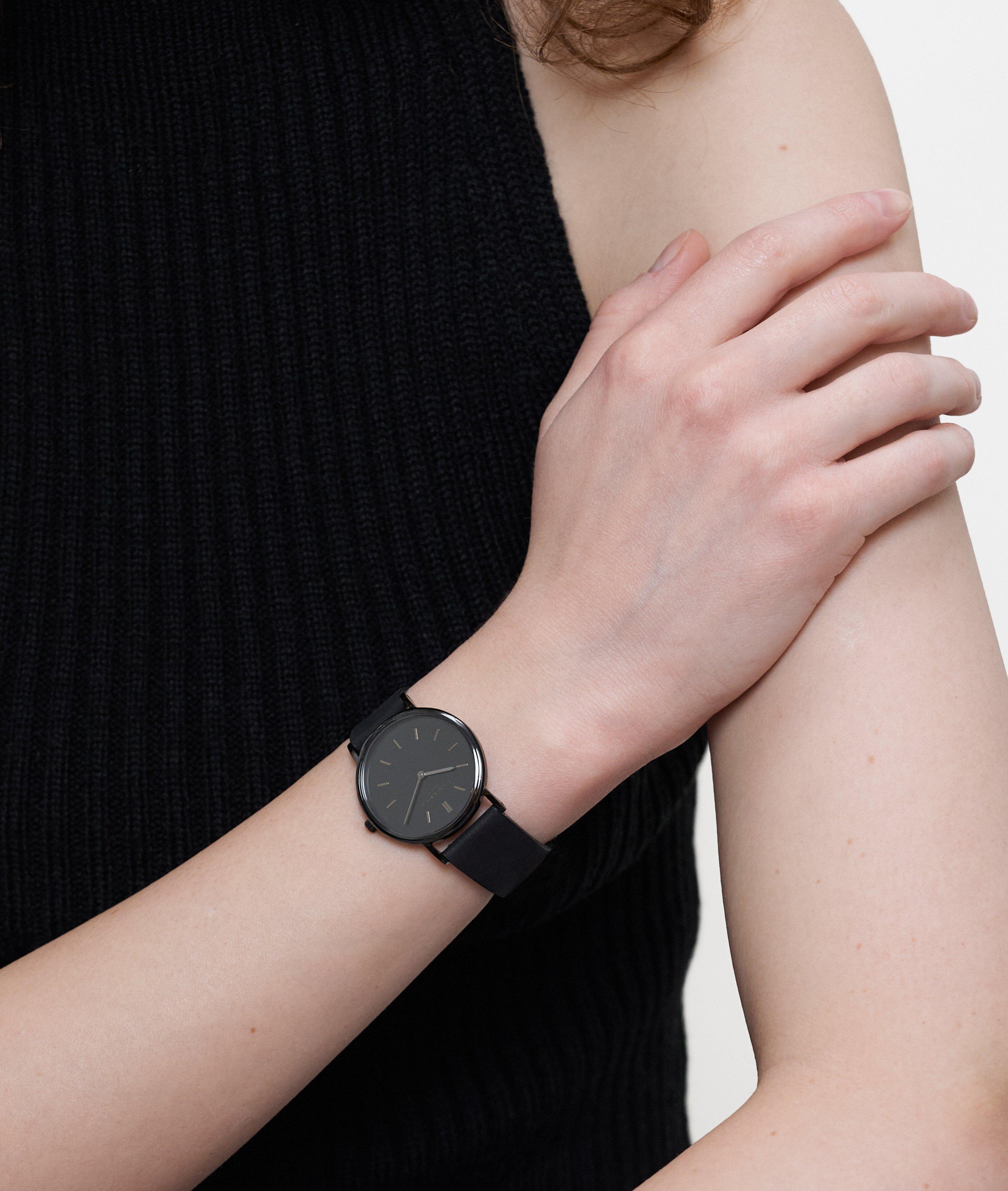 Uhr in schwarz, braun, gold & grau